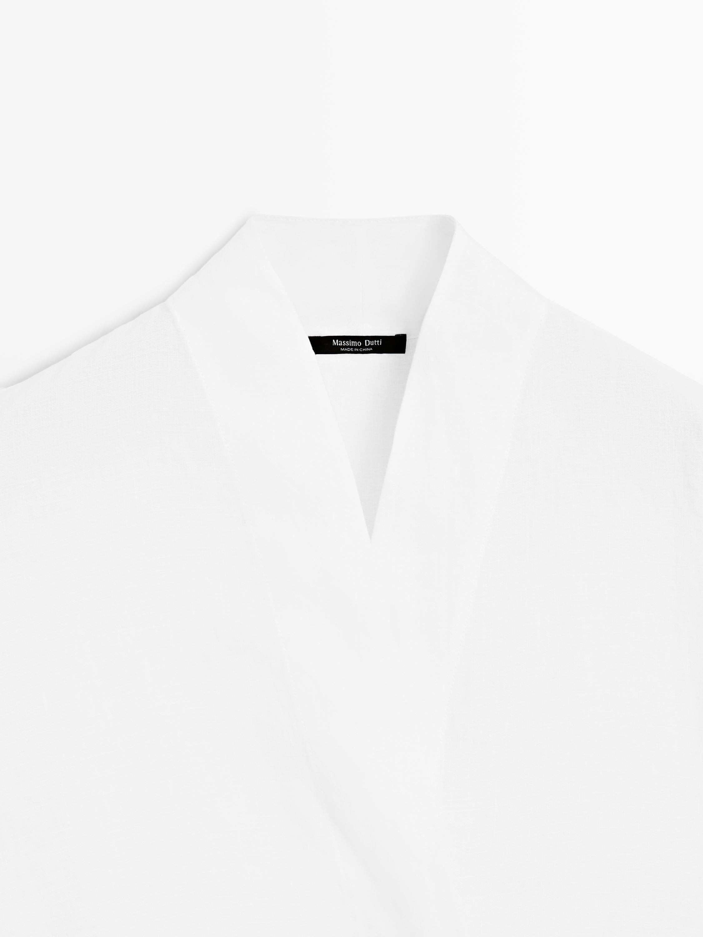 Flowing linen blouse with surplice neckline