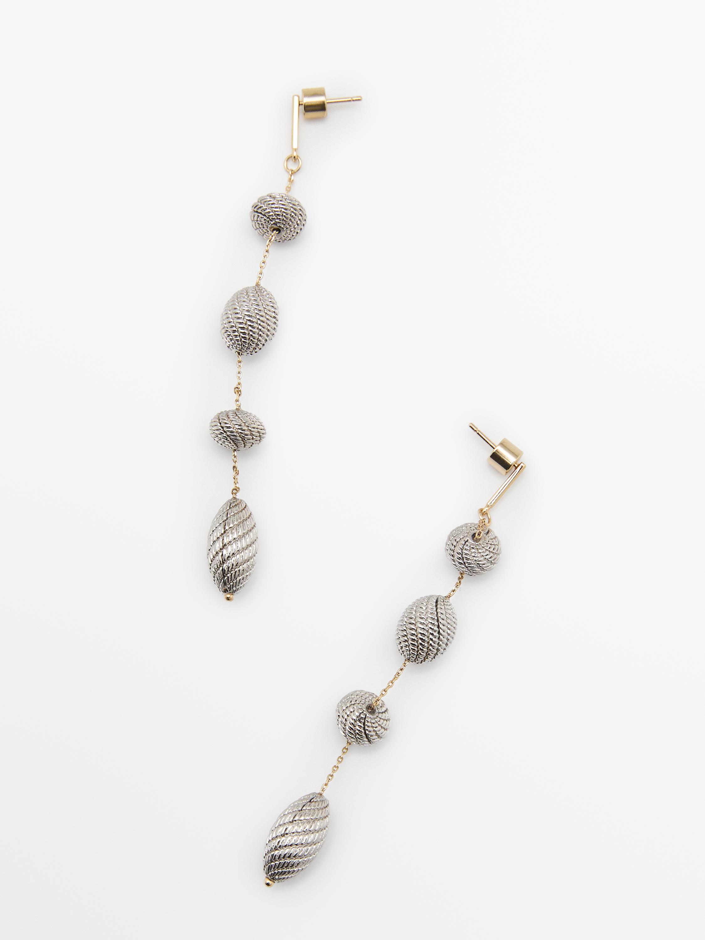 Boucles d’oreilles pendantes pièces texturées