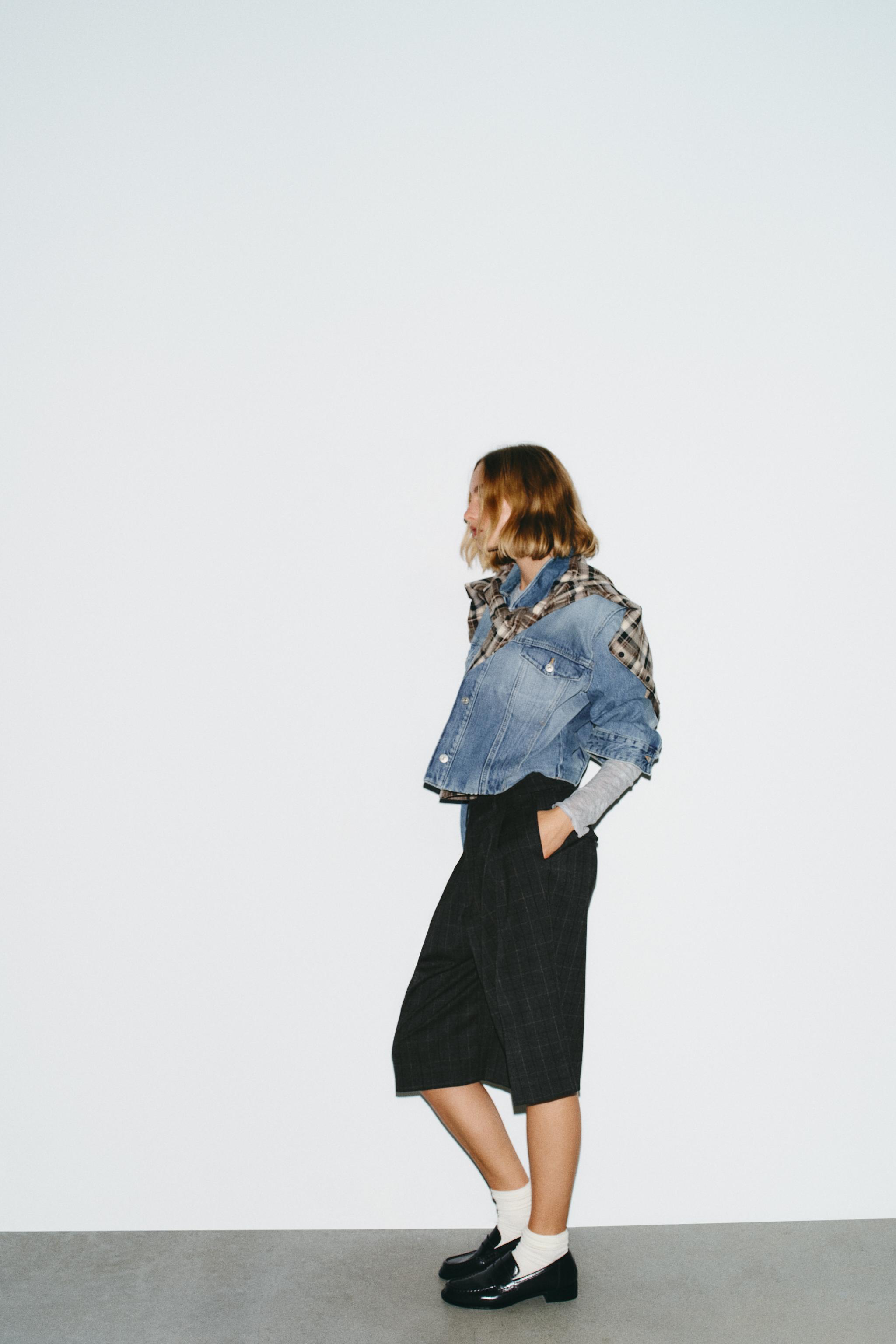 LONG PLAID PLEATED SHORTS