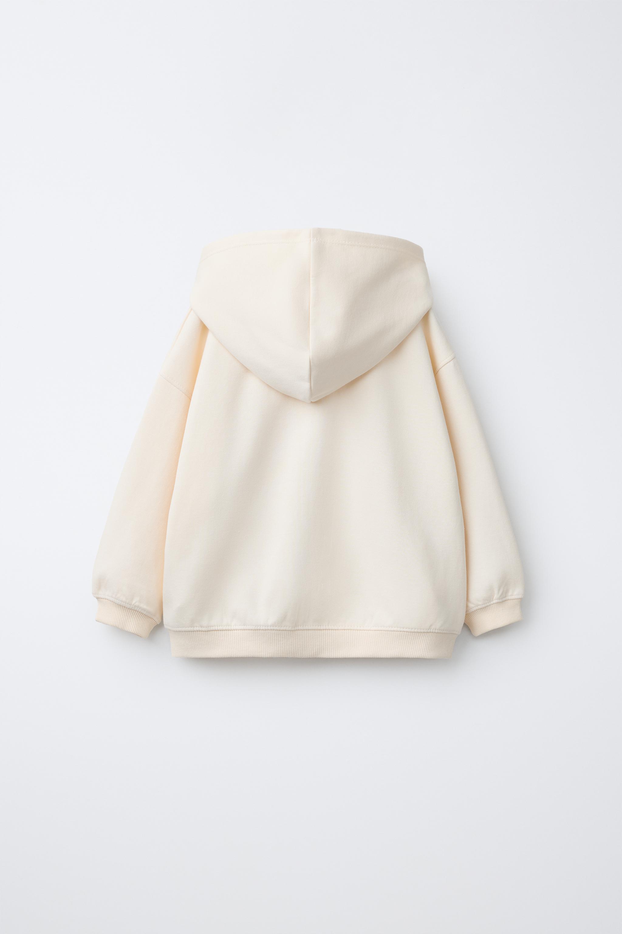INTERLOCK ZIP SWEATSHIRT WITH RAISED TEXT