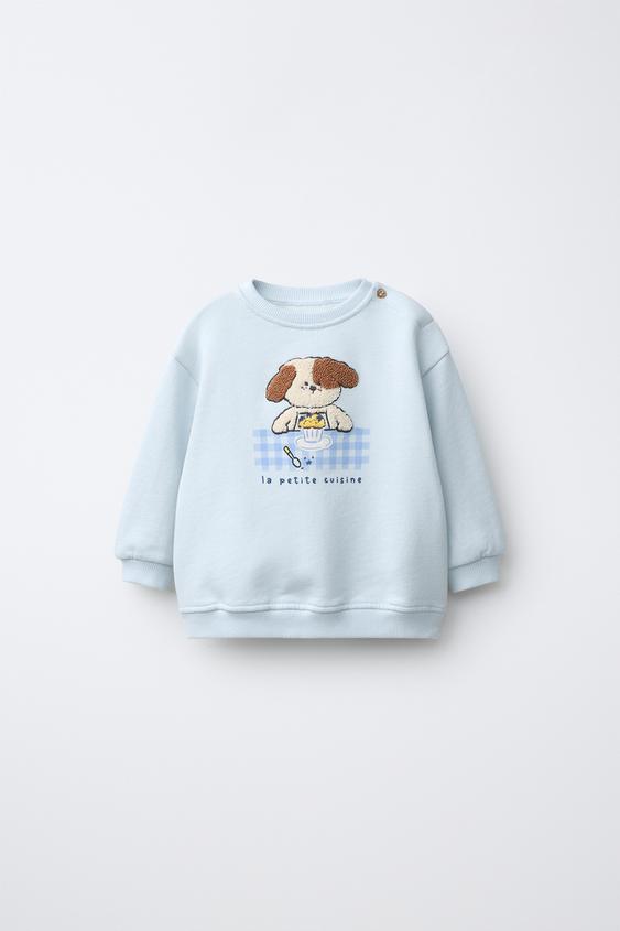 SUDADERA PERRITO RIZO - Azul claro de Zara - Imagen 0