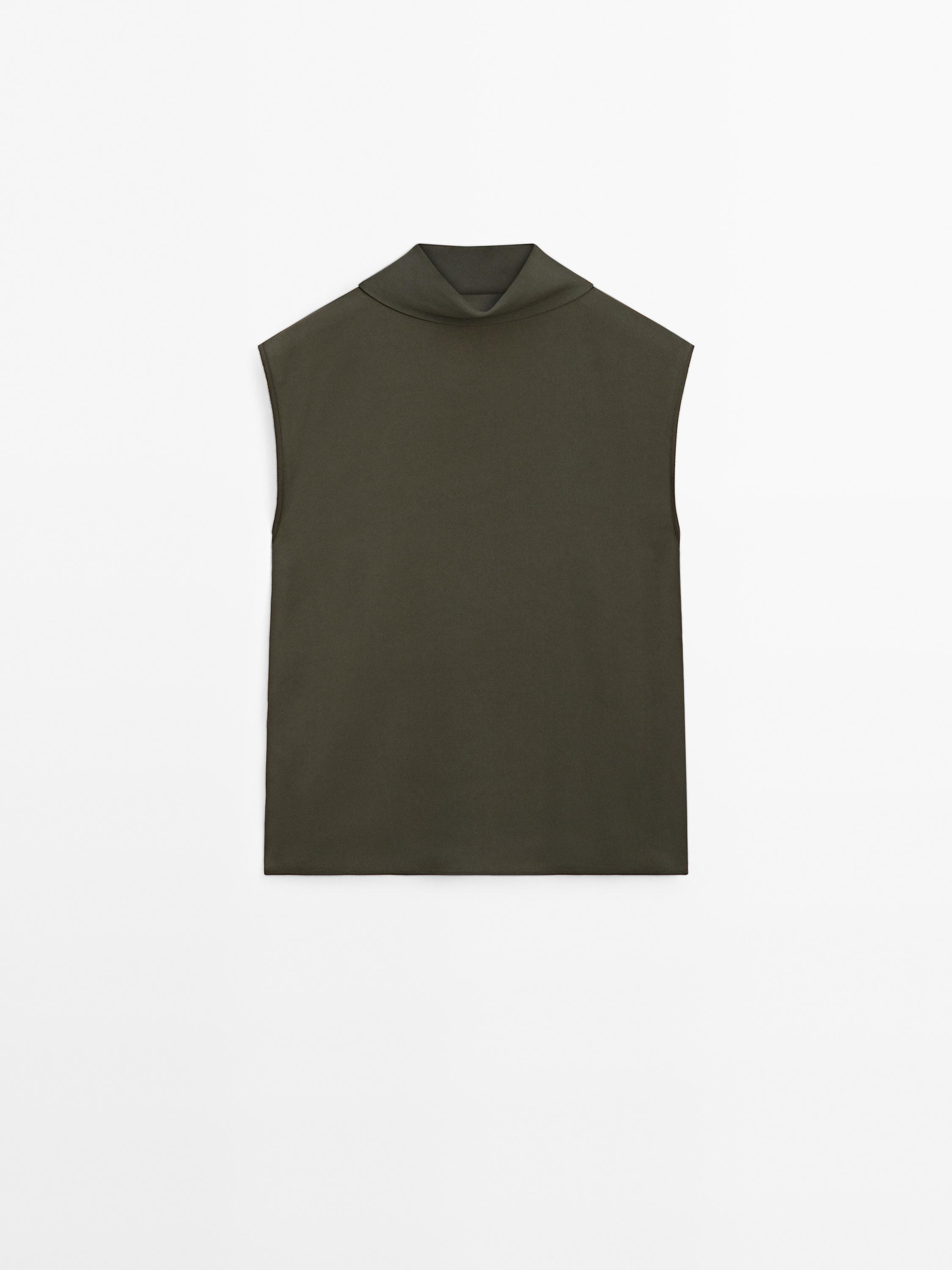 Flowing blouse with draped neck detail