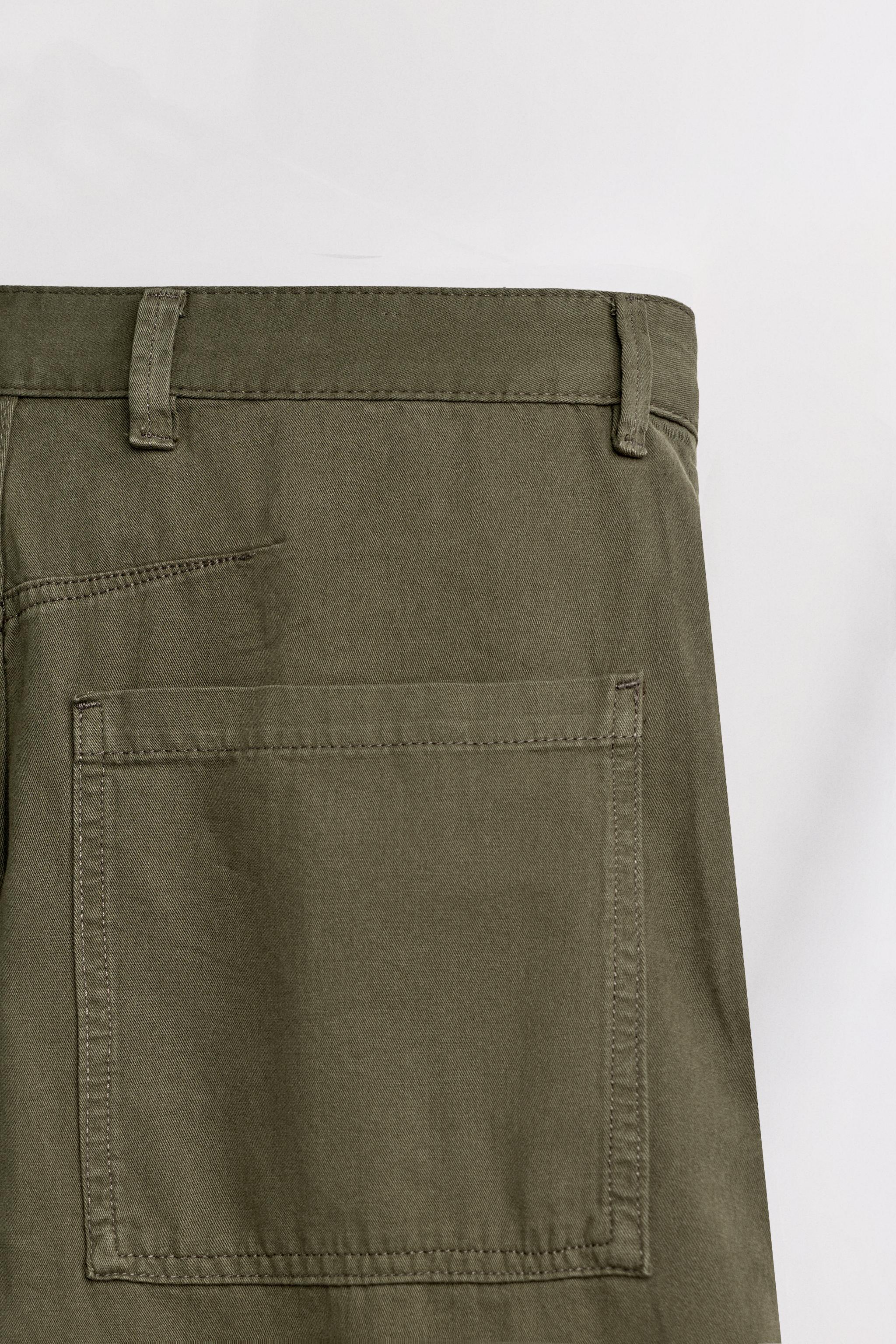 PLEATED PANTS WITH METAL HOOK