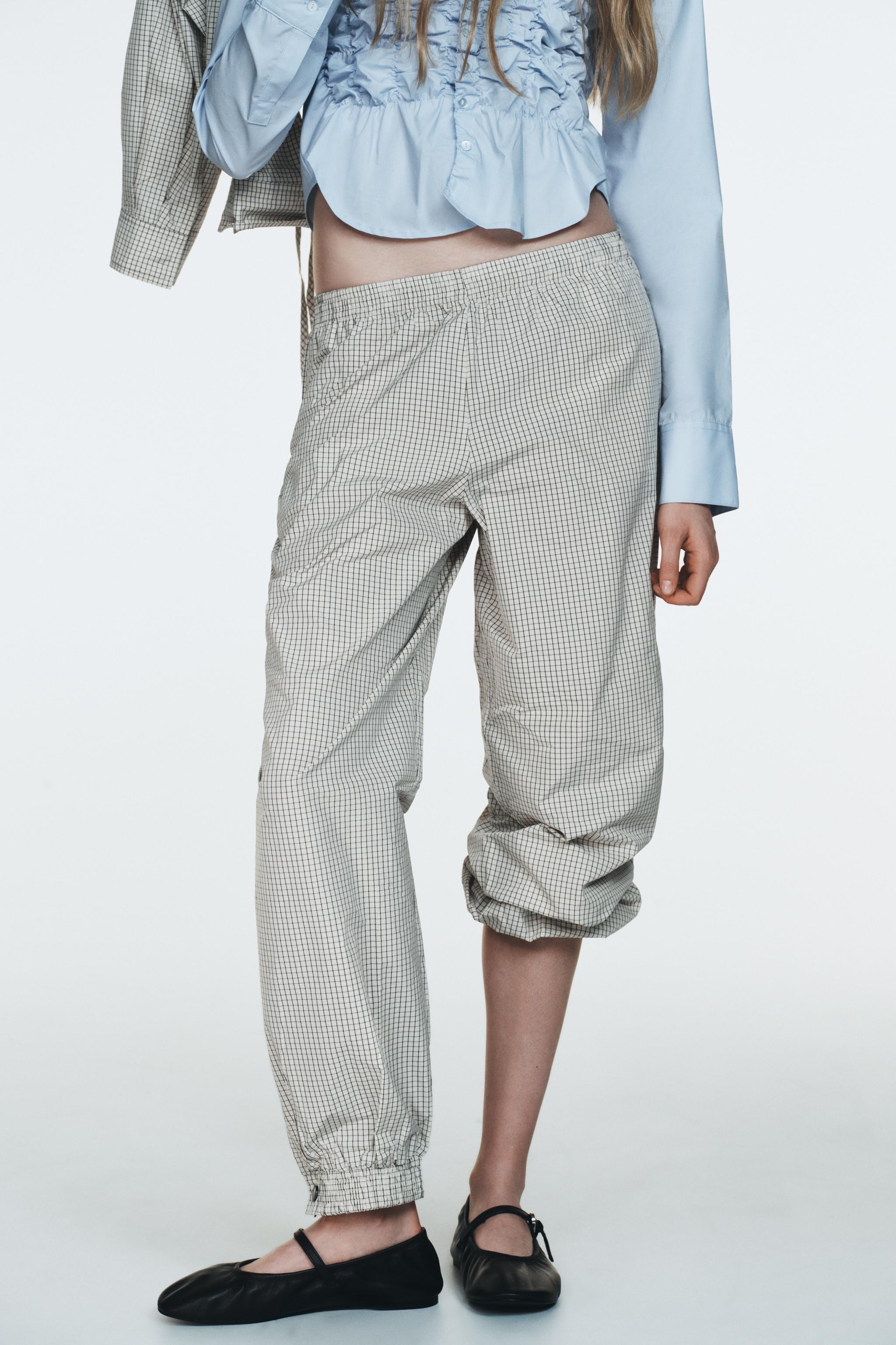 PANTALON BOUFFANT NYLON À CARREAUX
