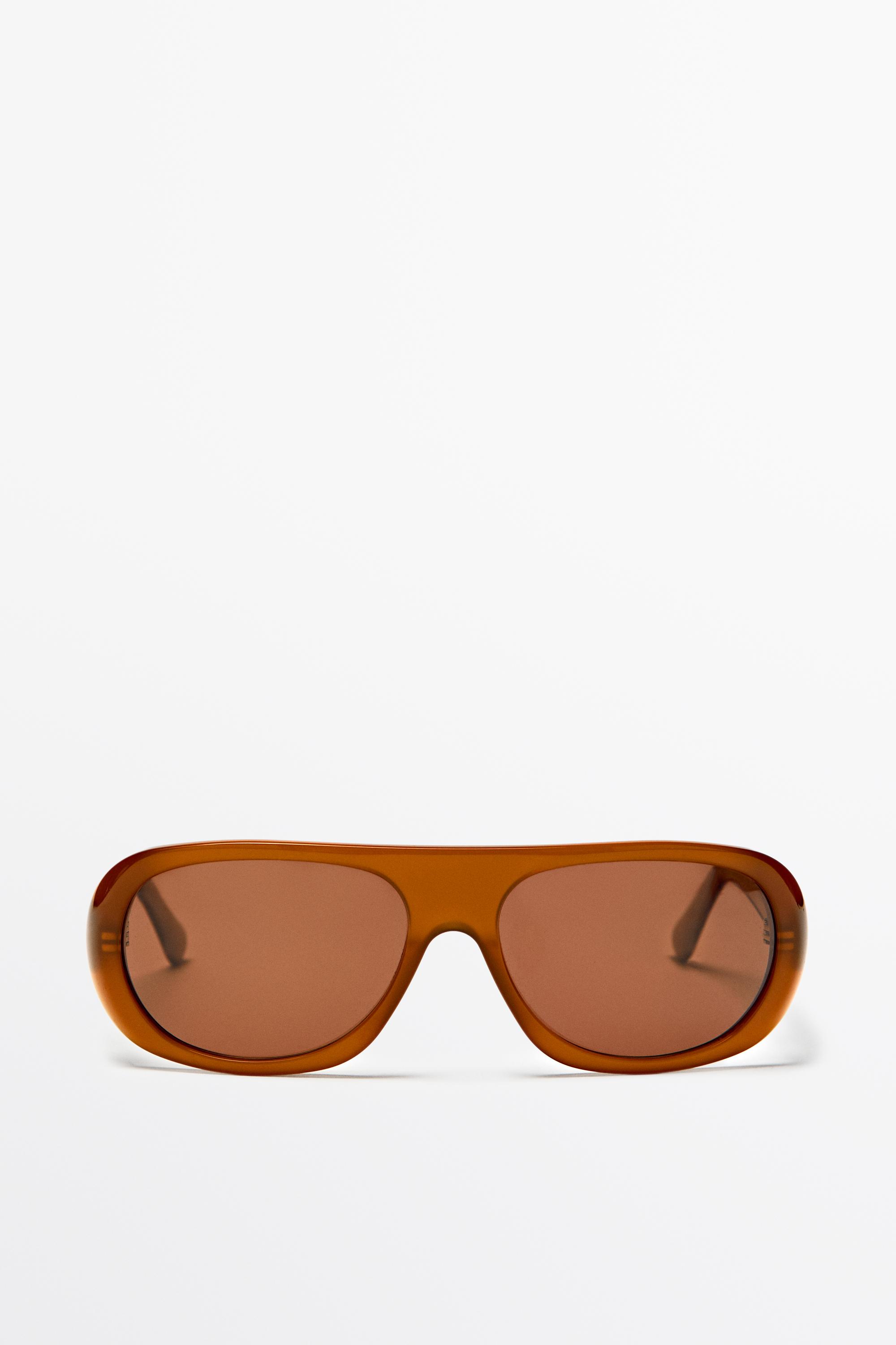 Lunettes de soleil enveloppantes