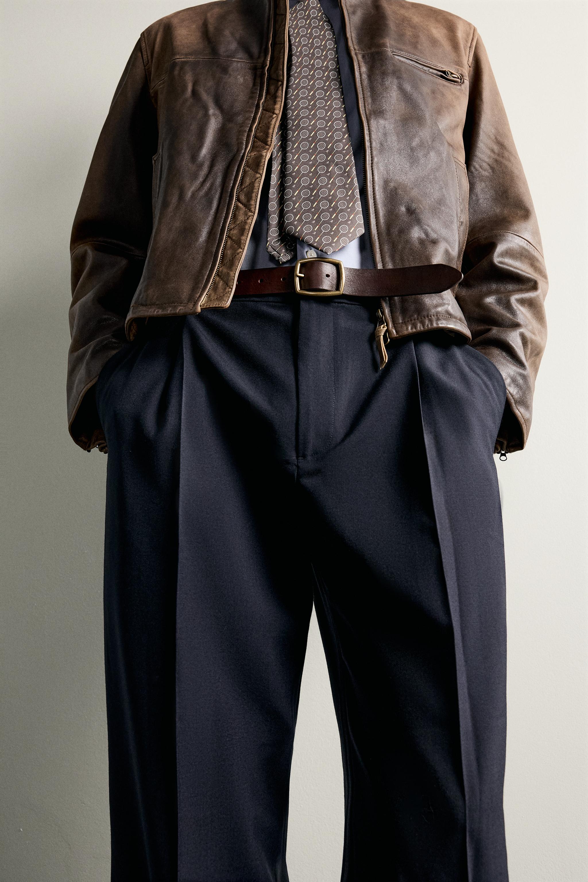 RELAXED FIT PLEATED PANTS
