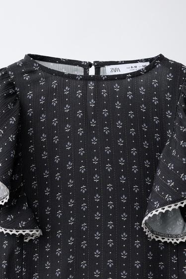 BLUSA VOLANTE FLORES - Estampado de Zara