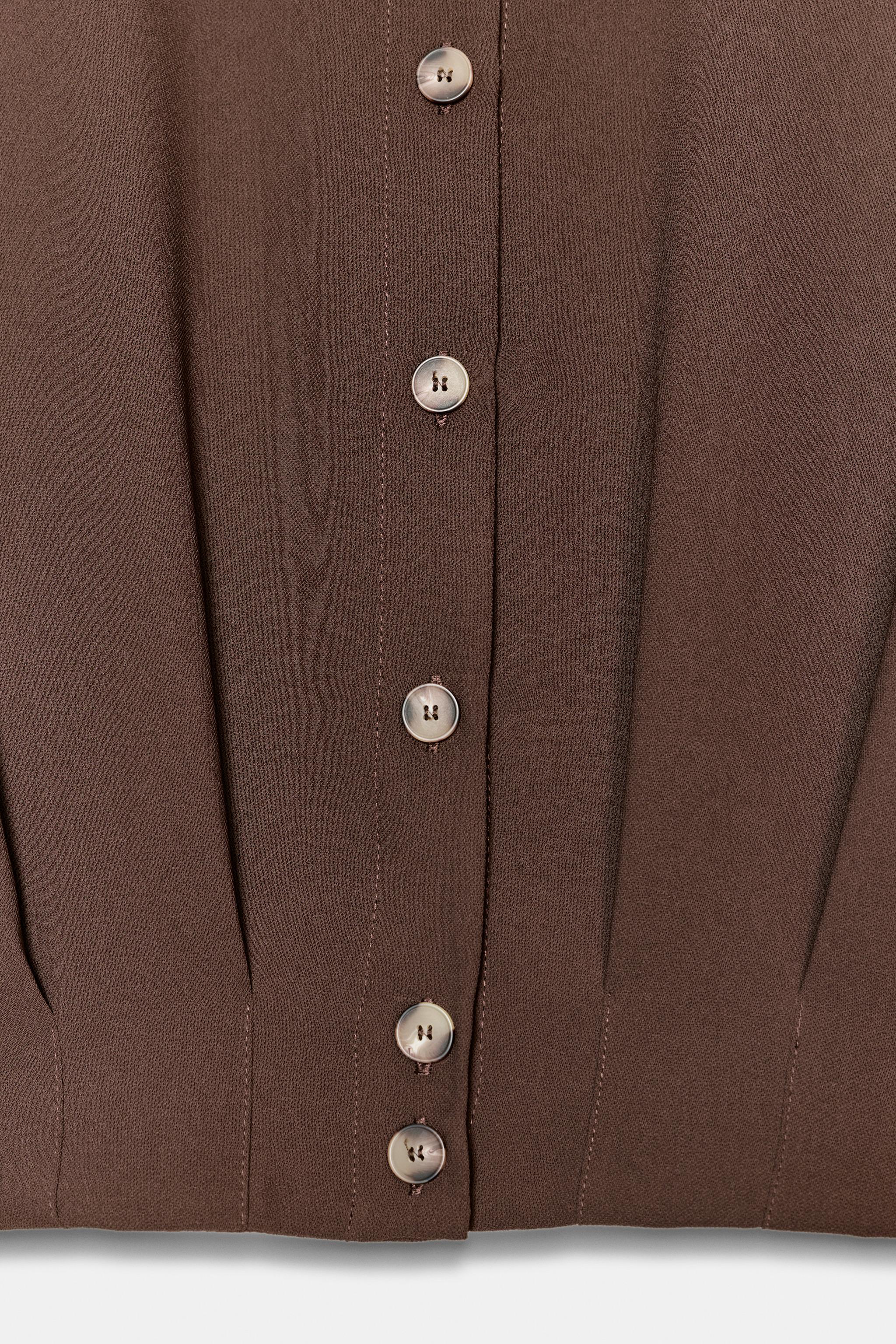 SHORT SHIRT WITH SHOULDER TABS