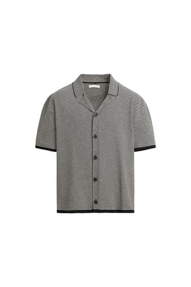 Front view of a black and white striped shirt, bowling collar, short sleeves, front button closure, and rib trim.