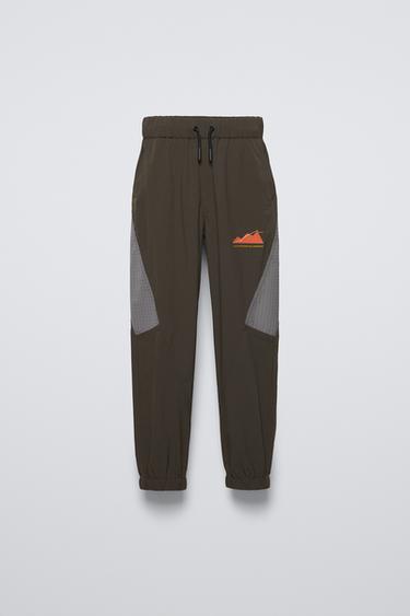 Zaras BYXA SPORTY I KOMBINERAT SPORTTYG - Mörk khaki