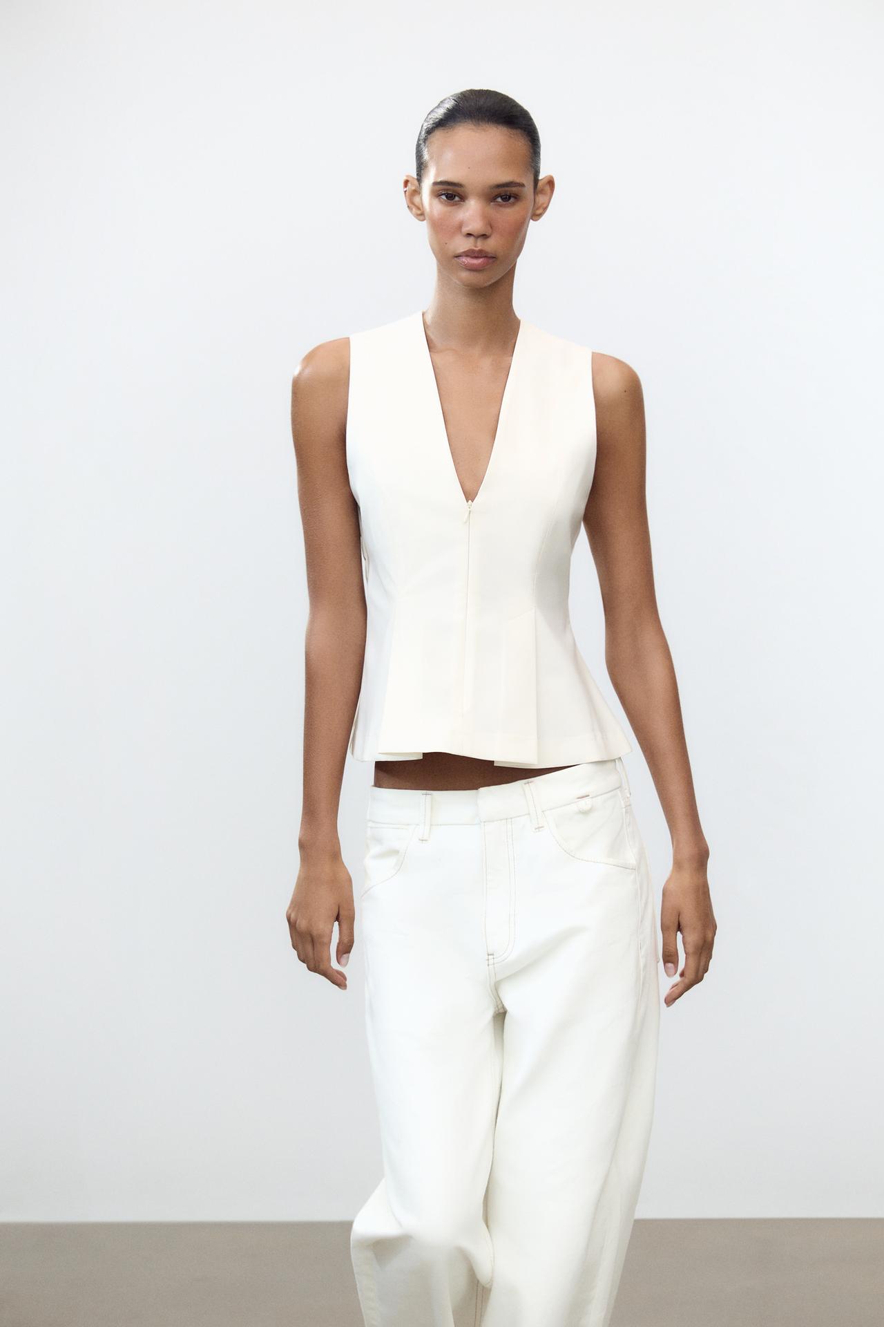 Peplum Top – Cotton‑blend boat‑neck top with peplum hem and hidden zip