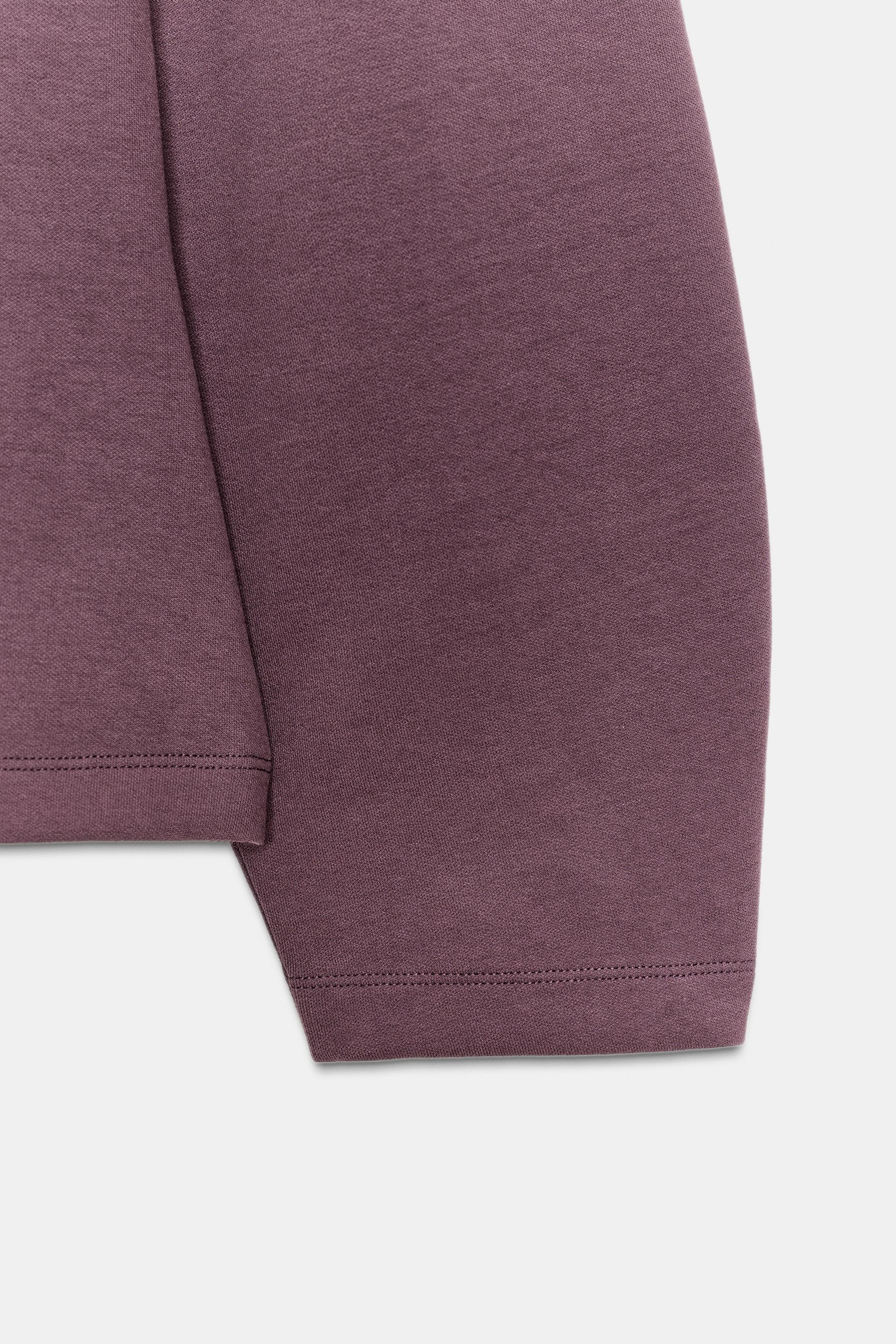 INTERLOCK JUMPER WITH DARTS