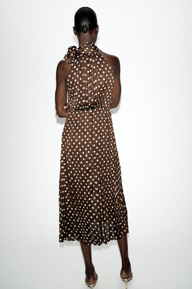 Vestido midi de lunares con moño 7
