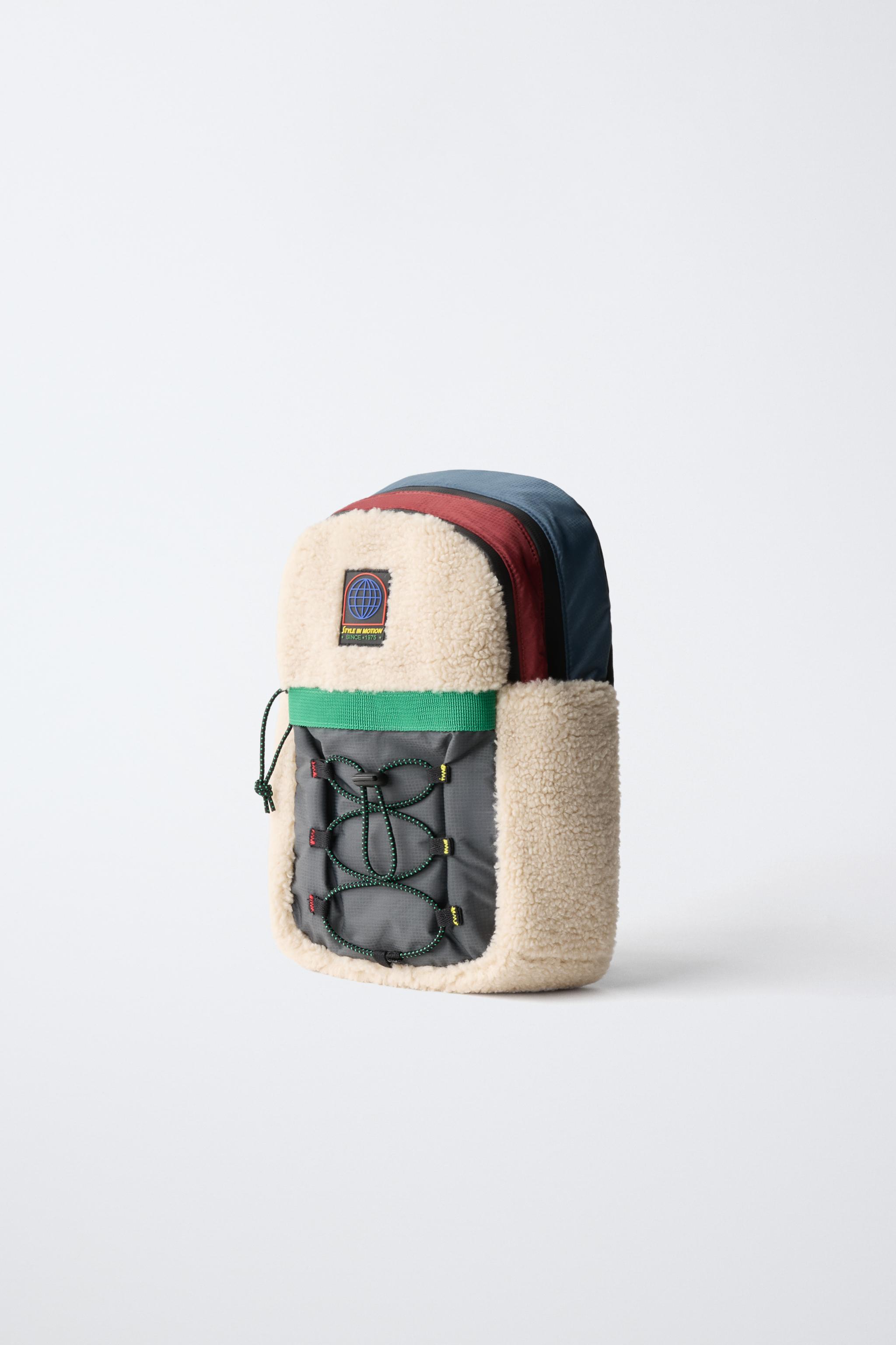 TECHNICAL FAUX SHEARLING CROSSBODY BAG