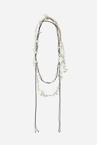 PACK DE 2 CEINTURES PERLES ET COQUILLAGES - 109 de Zara