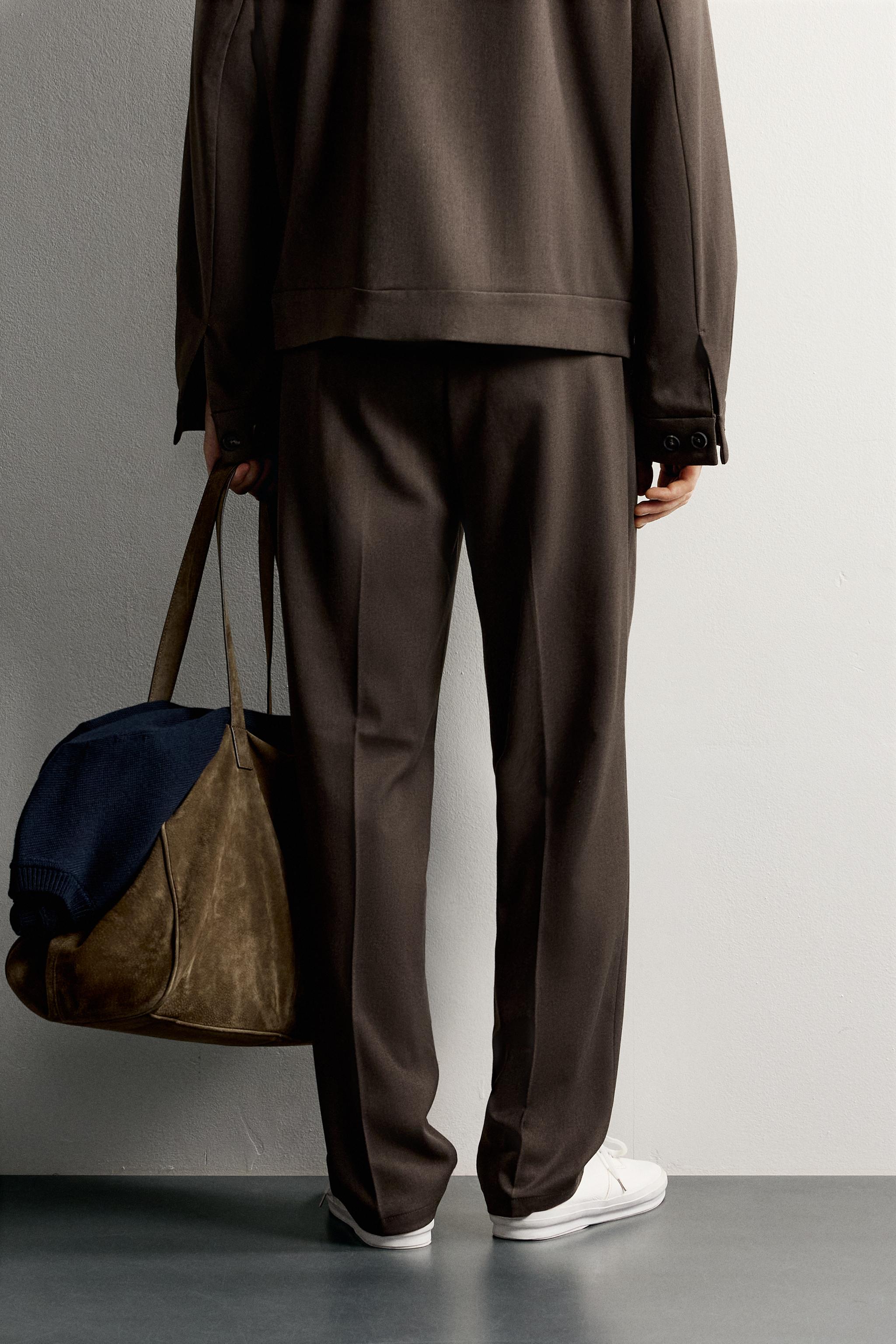 SLIM FIT PLEATED PANTS
