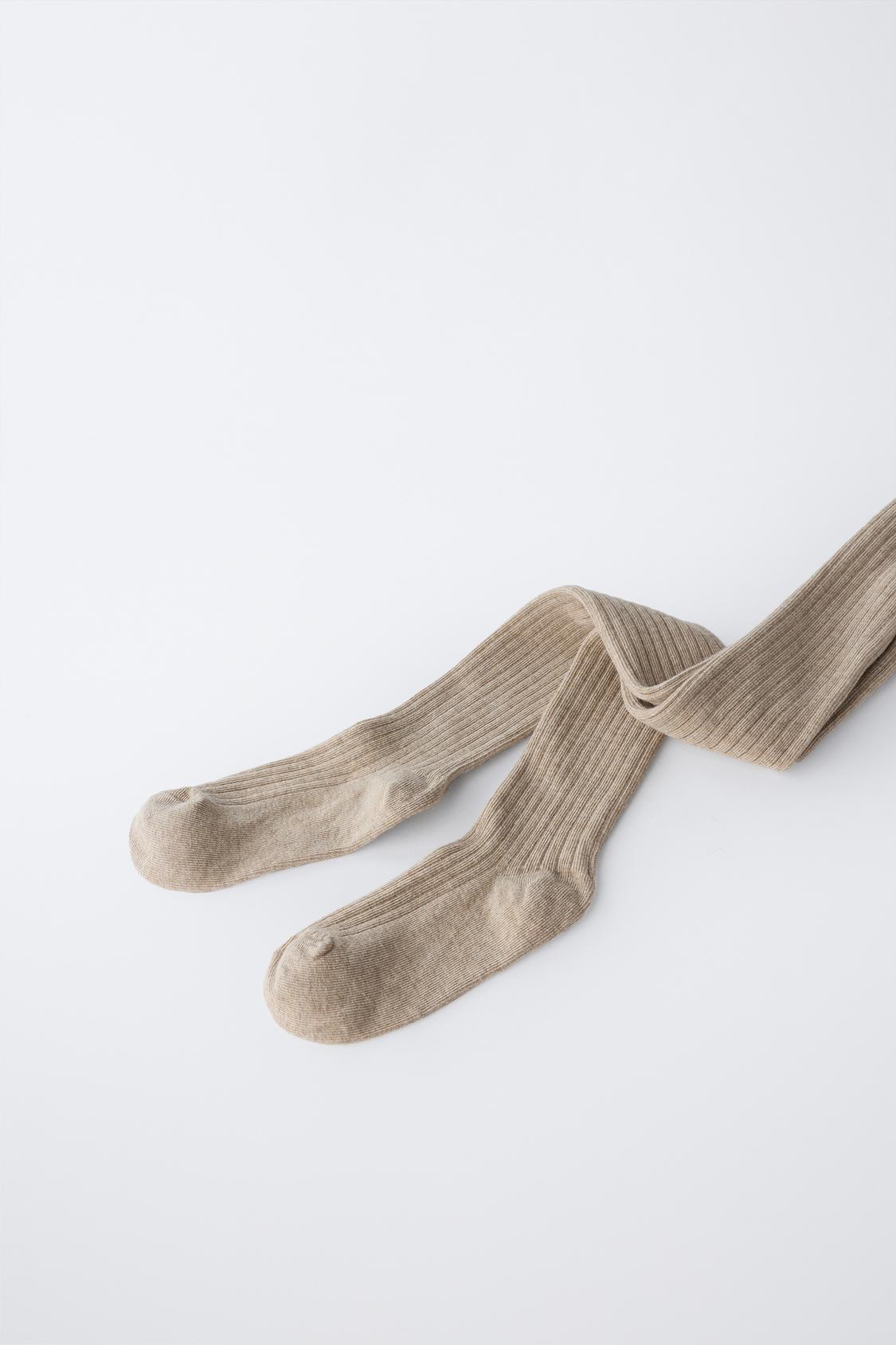 RIBBSTICKAD OCH ENFÄRGAD STRUMPBYXA