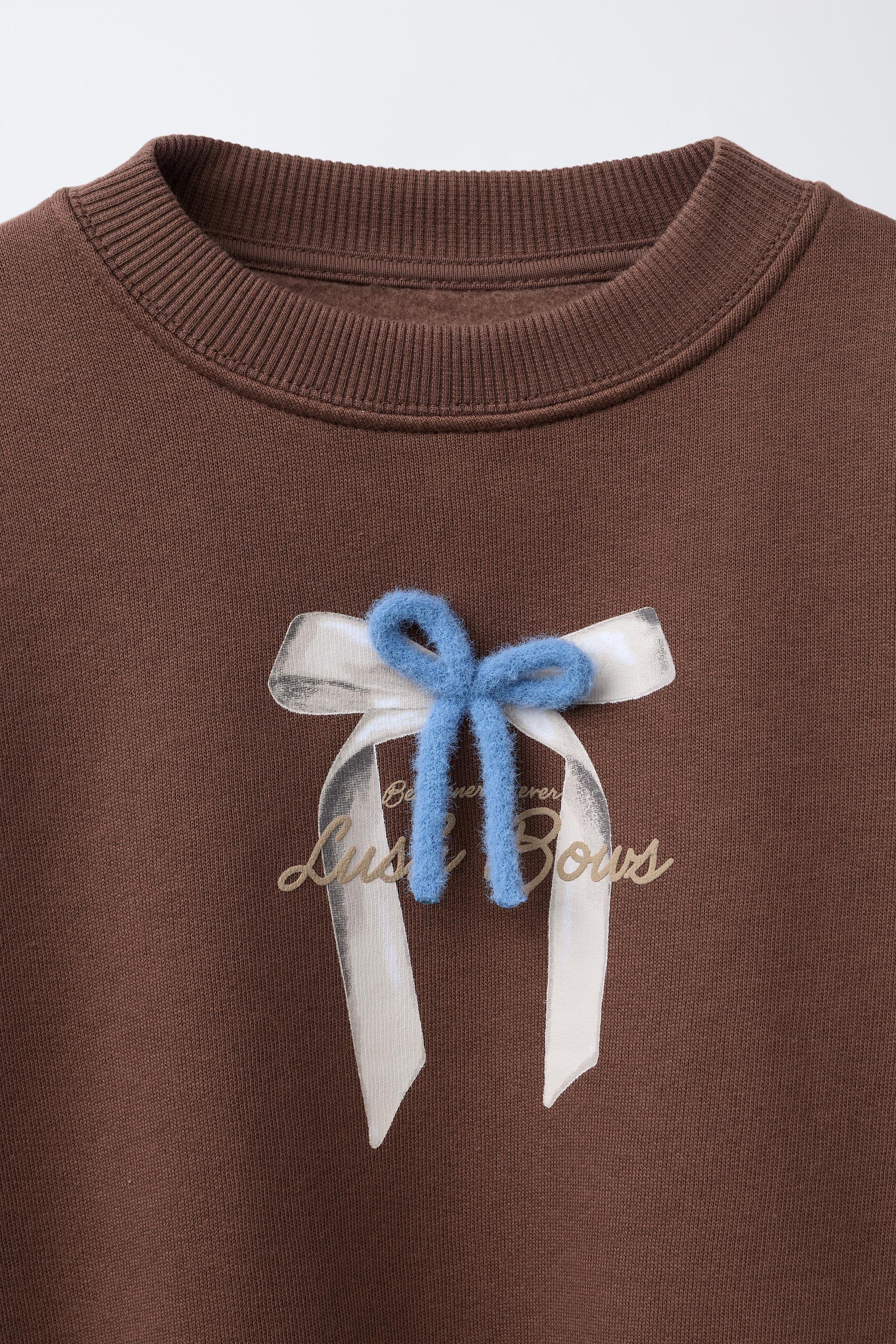 BOW TEXT SWEATSHIRT