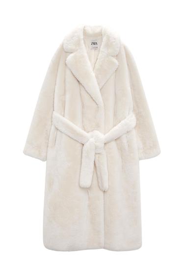 Long white teddy coat with a belt and wide lapels. Visible label with the text "ZARA" on the inside of the collar.