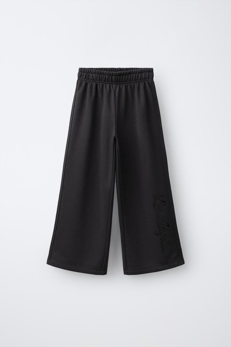 Pantalon felpa wide leg estampado texto