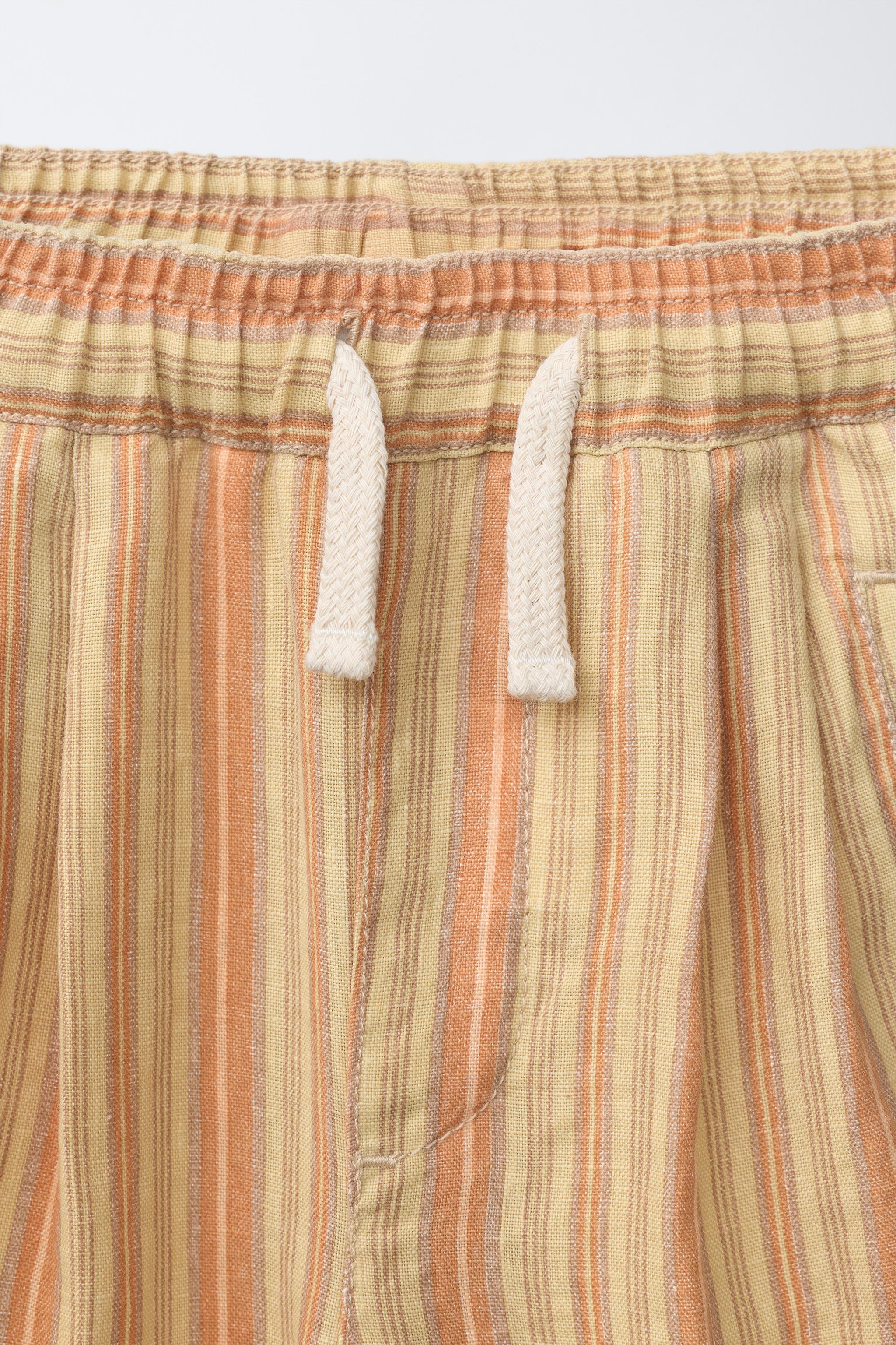 PANTALON RELAXED À RAYURES