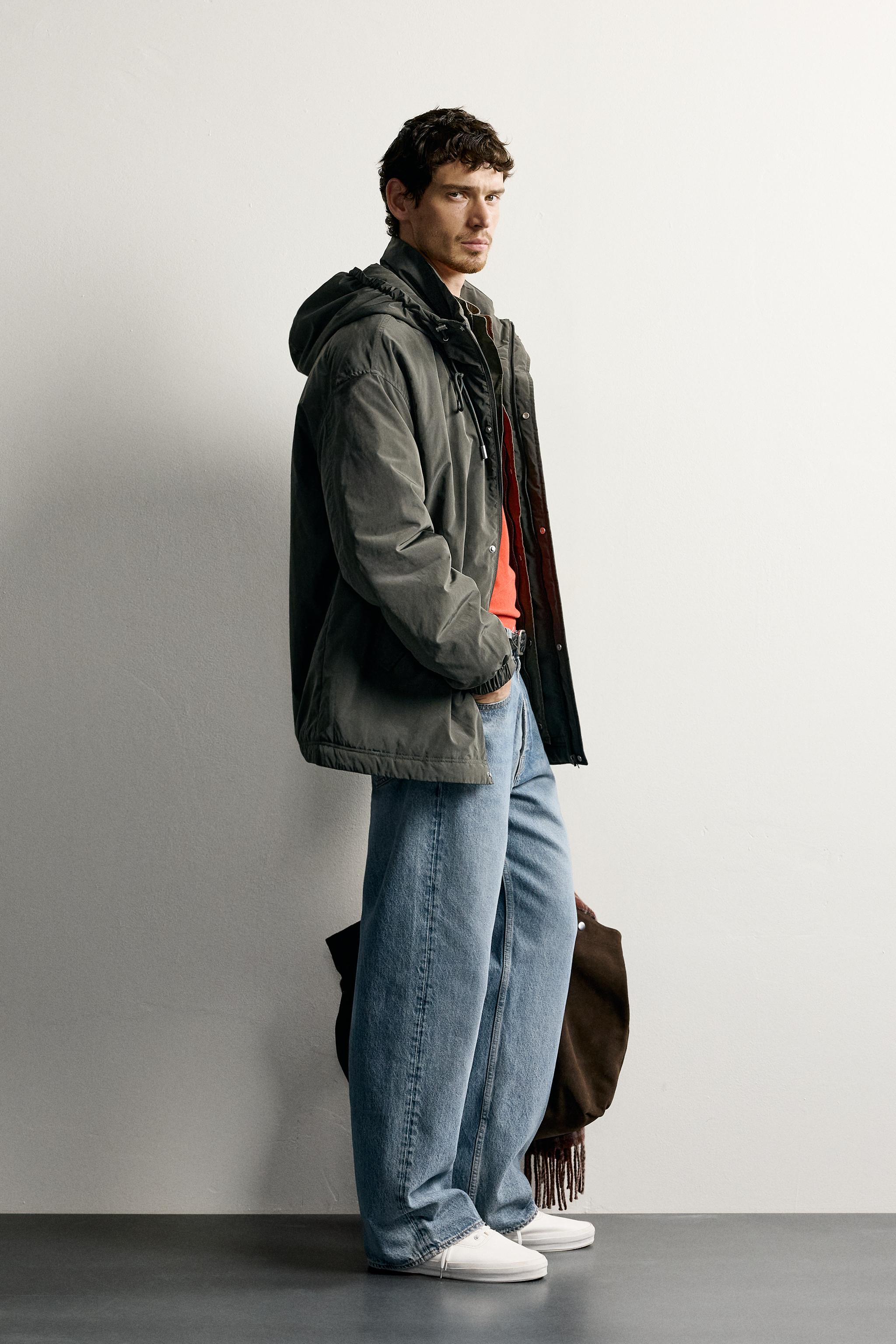 BLOUSON TECHNIQUE À CAPUCHE DÉPERLANT