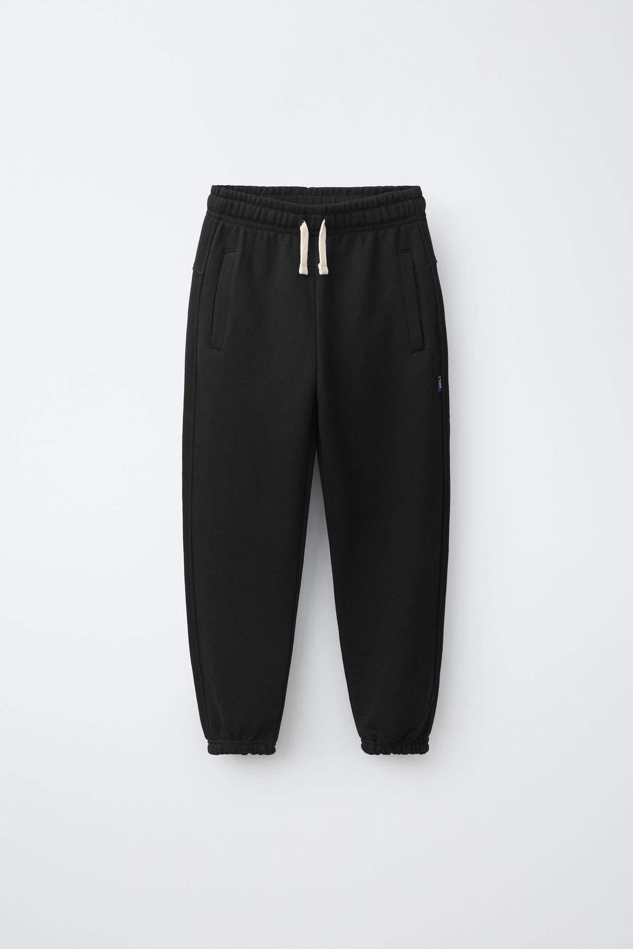 SOLID FLEECE JOGGERS WITH LABEL — Black