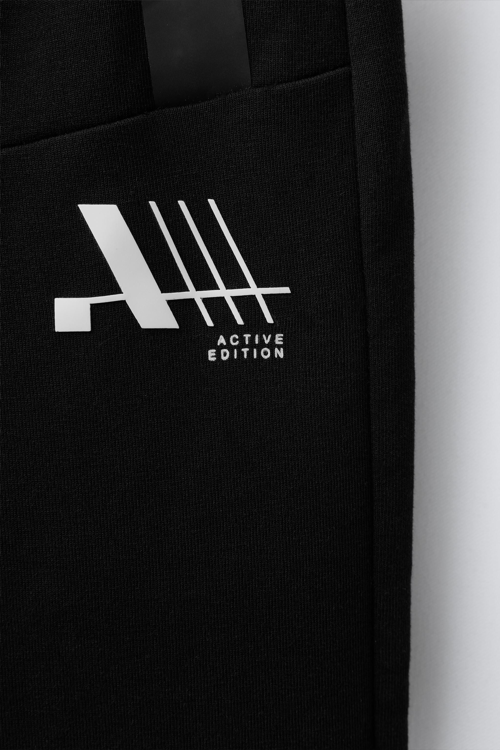 SPORTY INTERLOCK JOGGERS