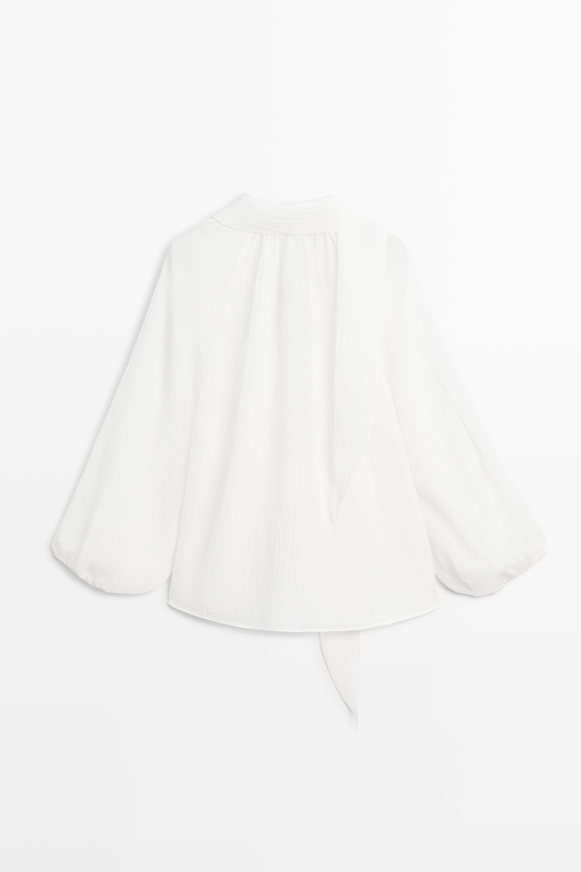 Blouse fluide col en V avec nœud