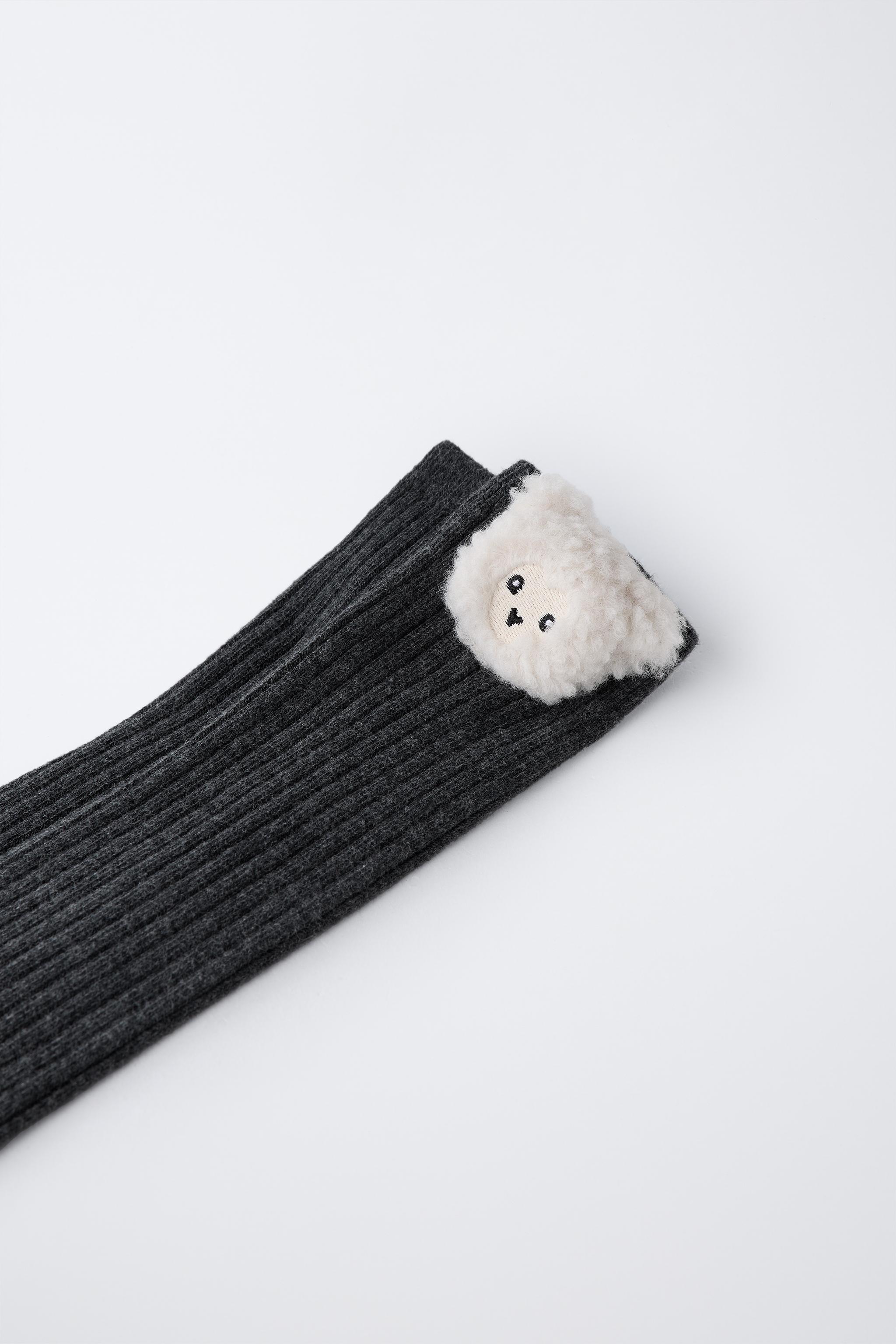 LONG RIBBED SOCKS WITH ANIMAL DETAIL