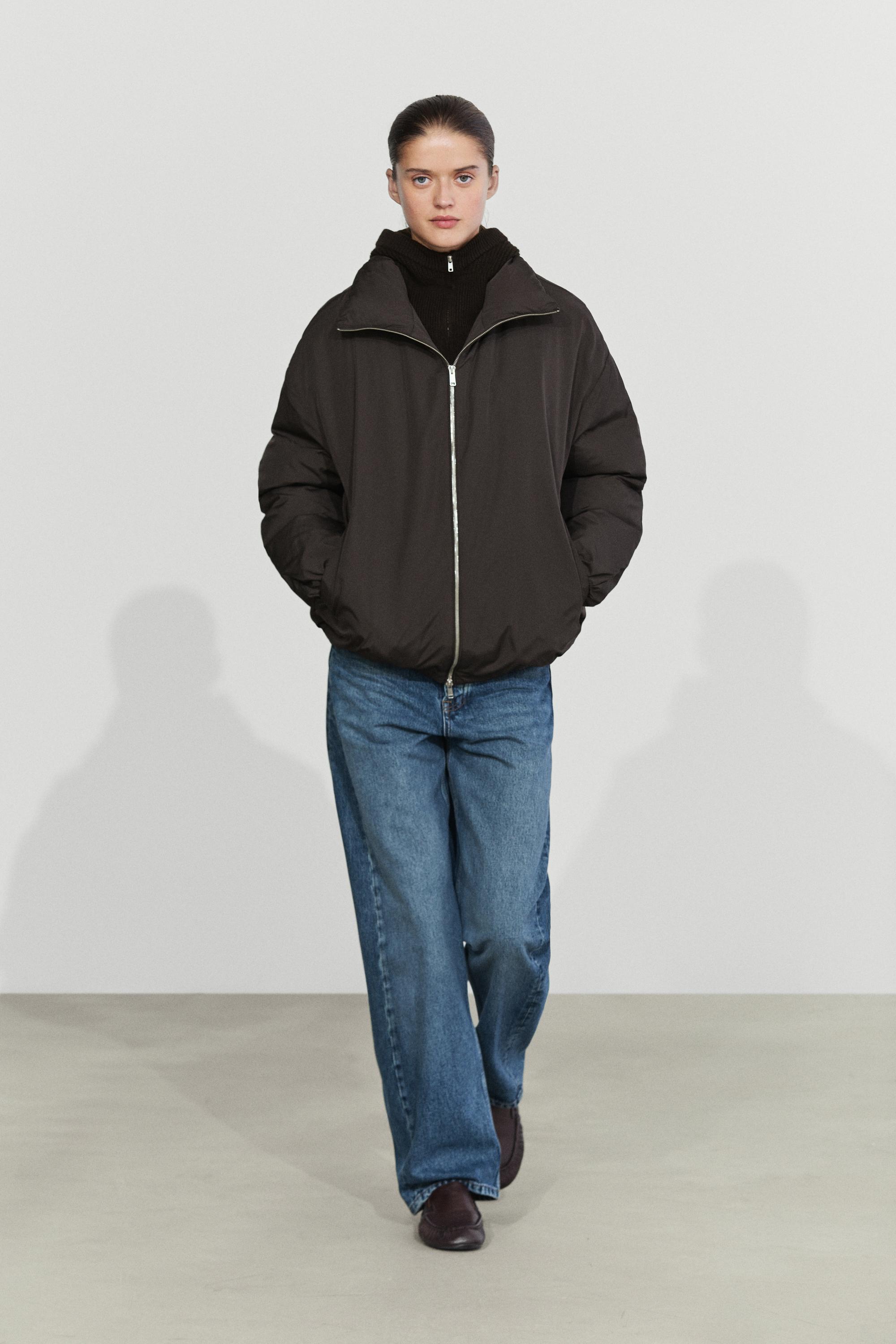 Down jacket with detachable detail piece