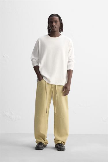 ДЖИНСЫ BAGGY ИЗ ВОЩЕНОЙ ТКАНИ — ЖЕЛТЫЙ от Zara — изображение 0