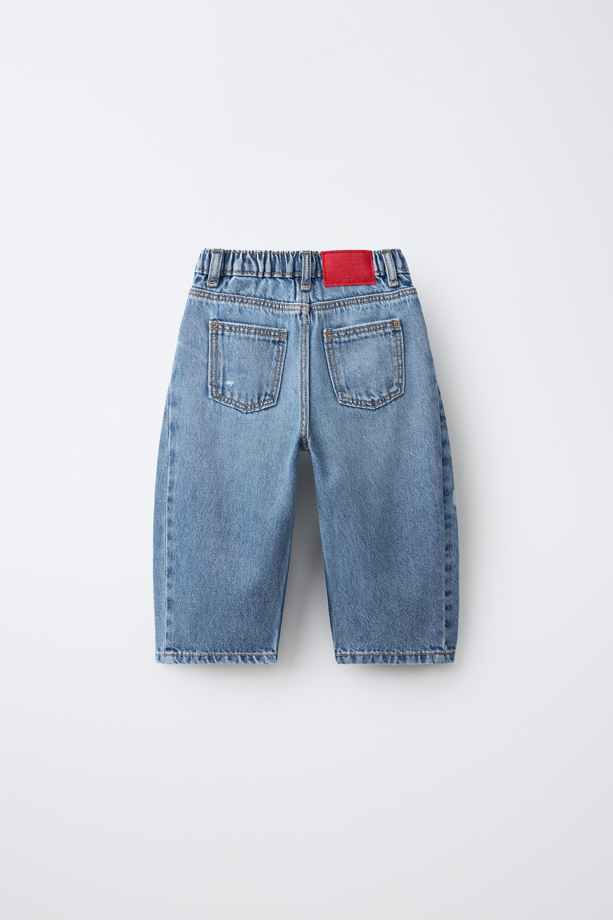 DISTRESSED BARREL JEANS