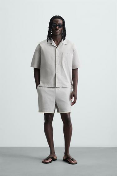 CAMISA TÉCNICA RELAXED FIT - Gris perla de Zara - Imagen 0