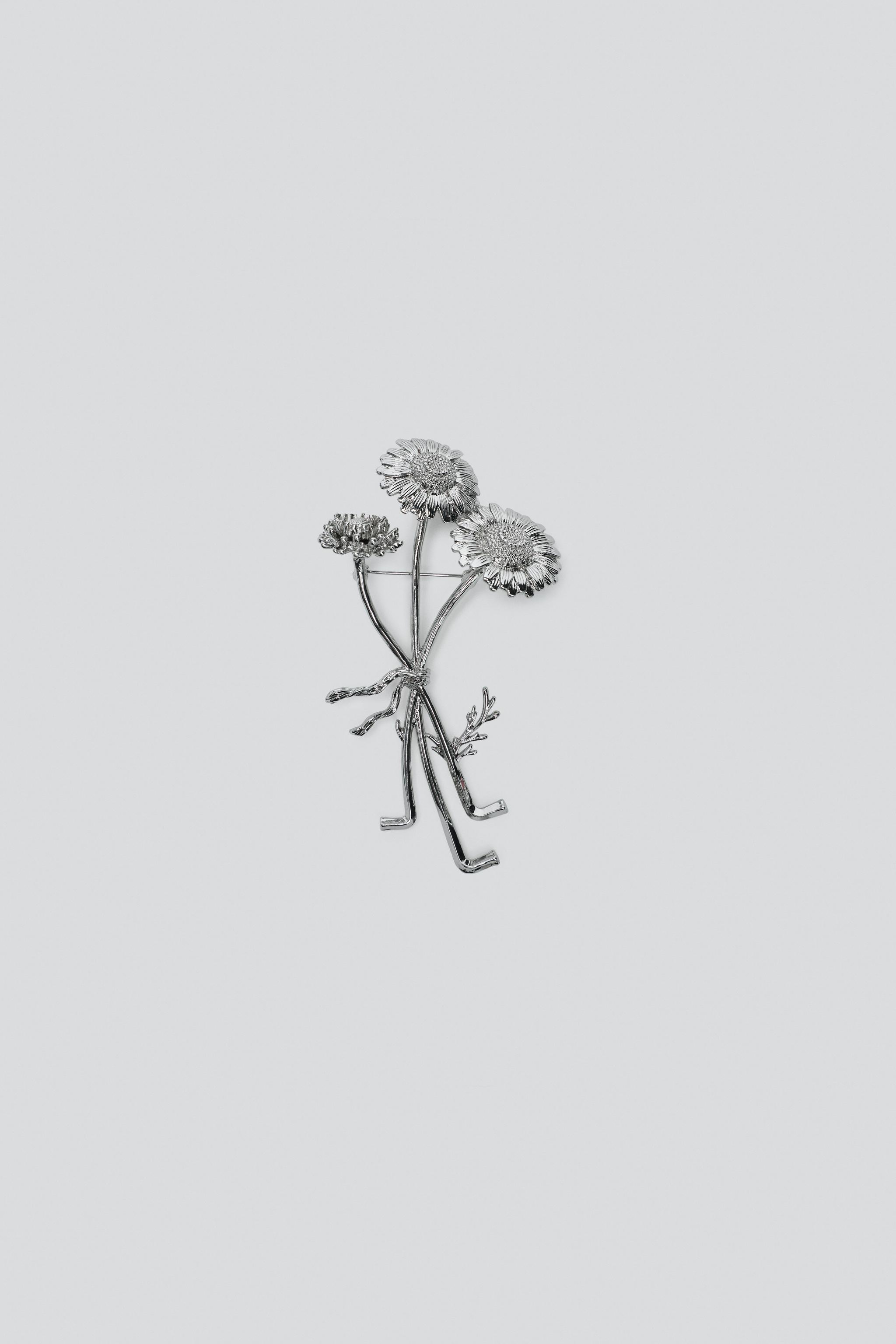 BROCHE MÉTALLIQUE 3 FLEURS
