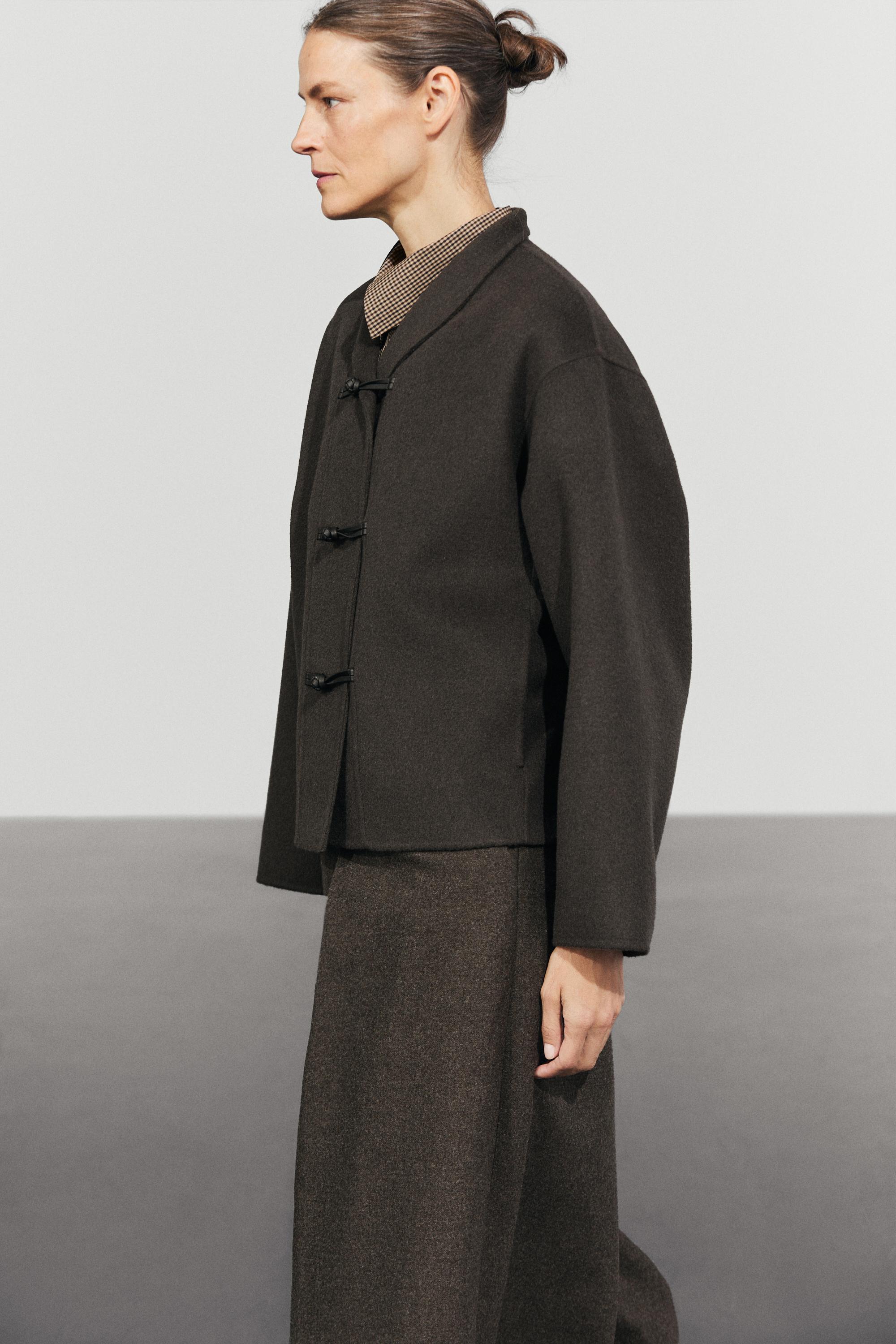Short wool blend coat with button details