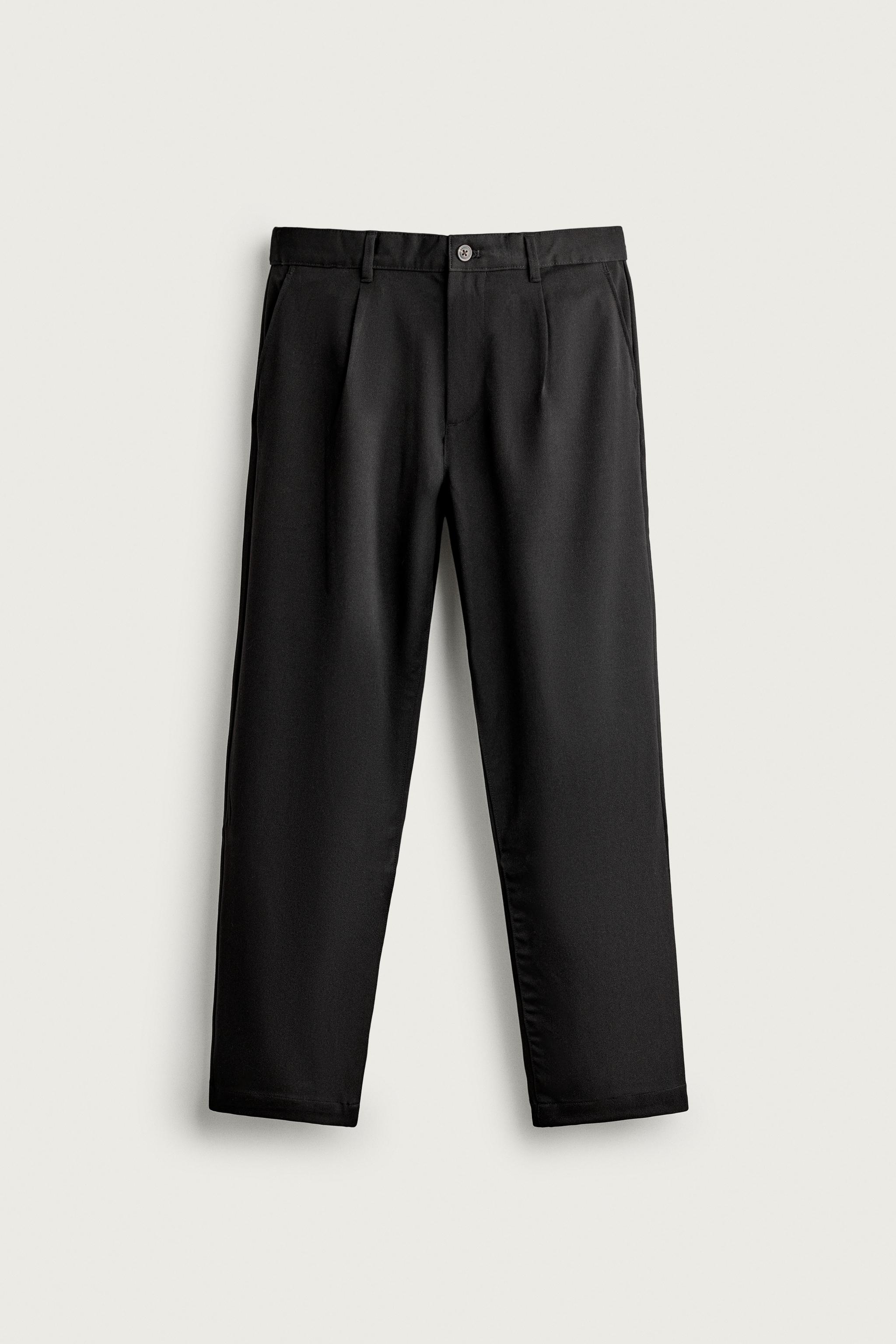 RELAXED FIT PLEATED PANTS — Black