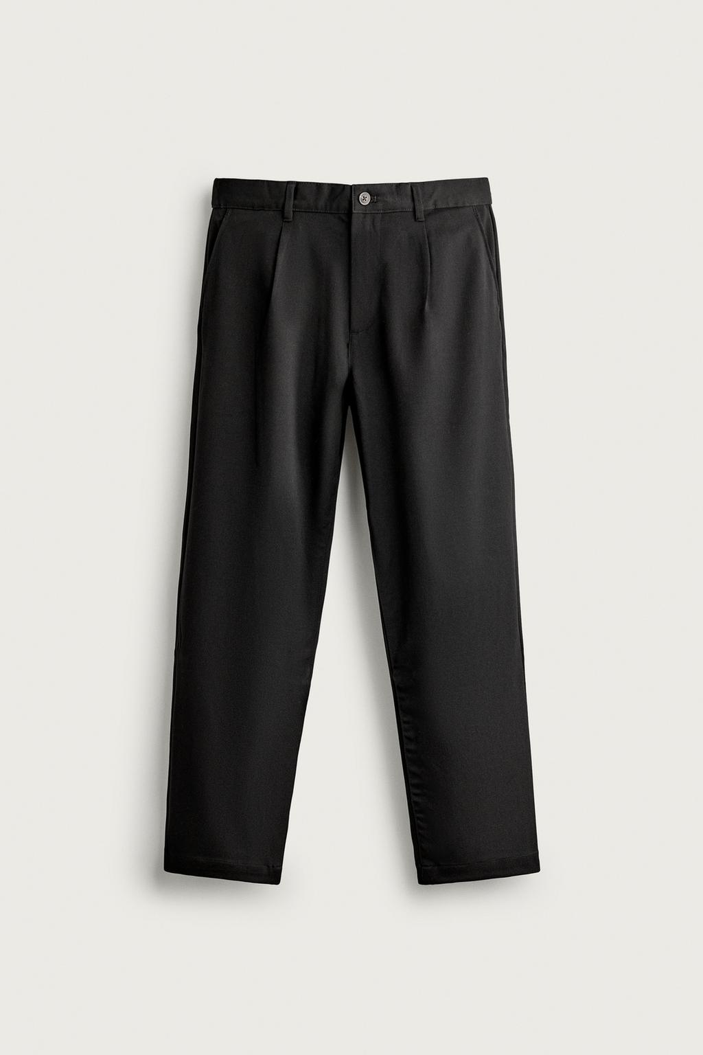 RELAXED FIT PLEATED TROUSERS
