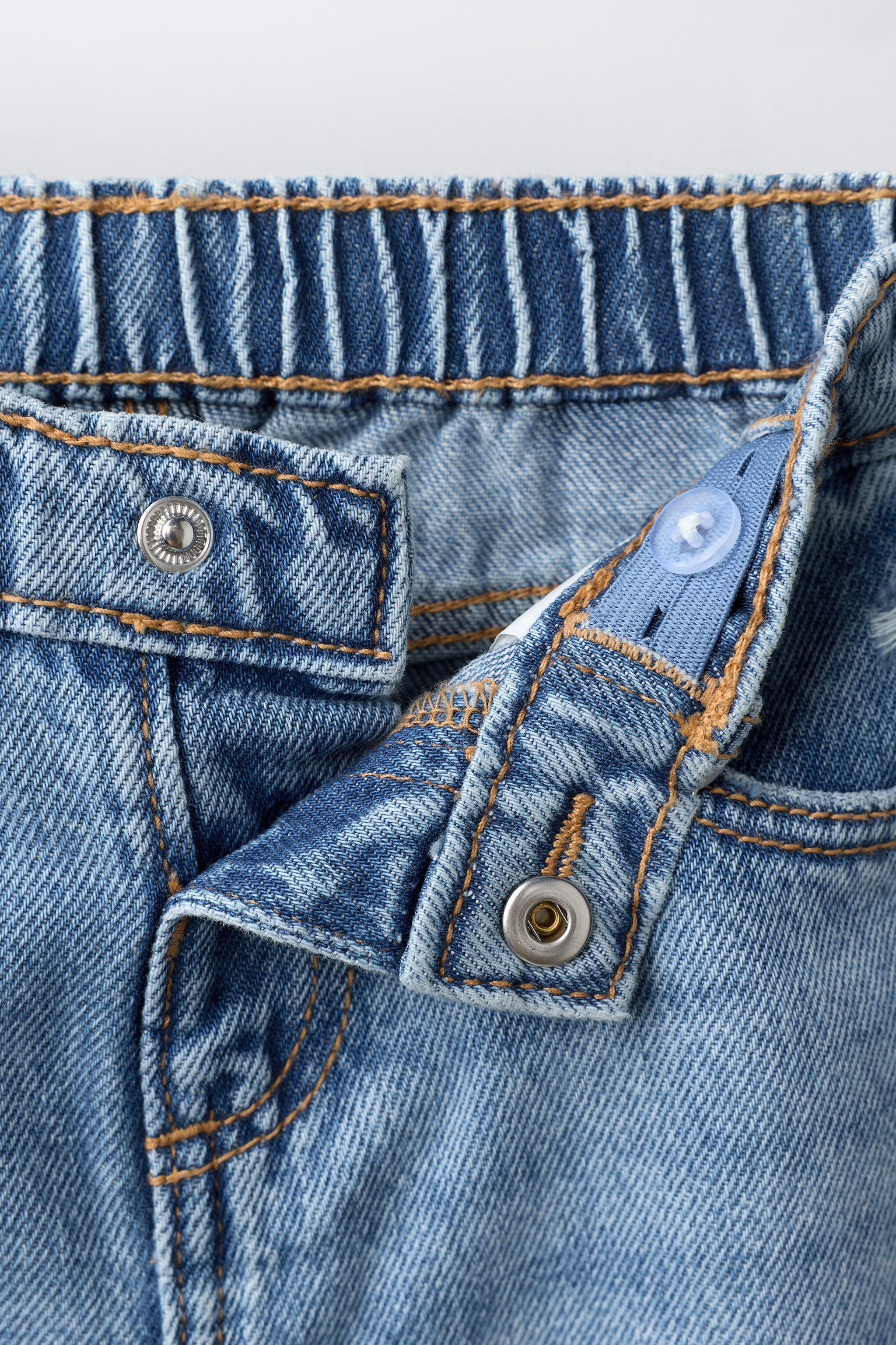 DISTRESSED BARREL JEANS