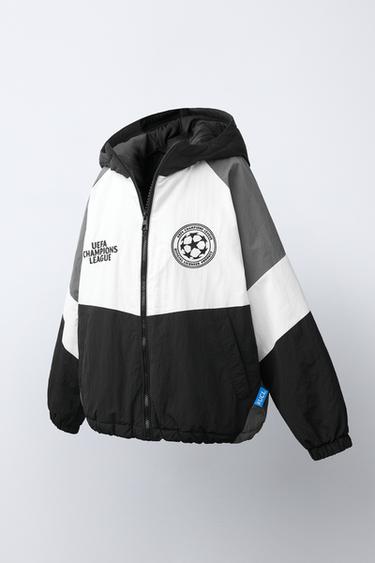 COLOUR BLOCK UEFA CHAMPIONS LEAGUE® JACKET — Black 1