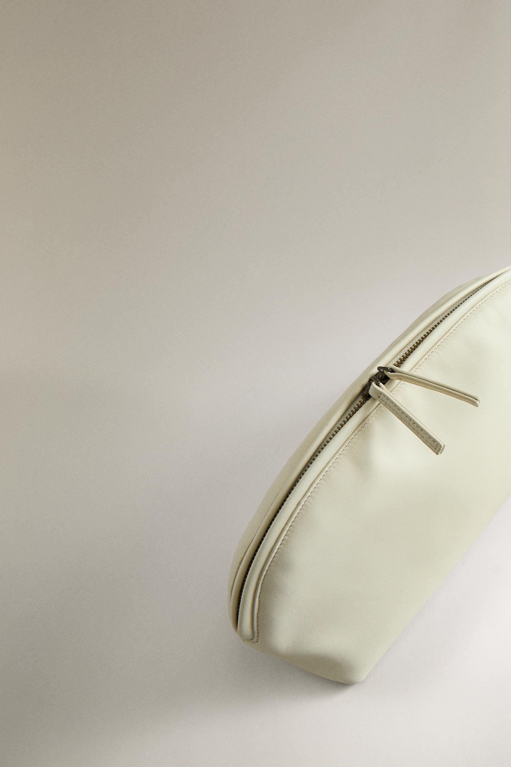 TROUSSE DE TOILETTE CUIR DEMI-LUNE