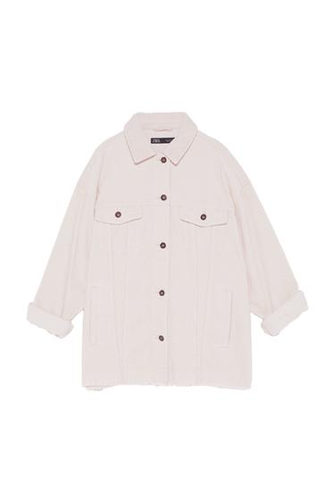 Front view of a beige jacket with front pockets and dark buttons.