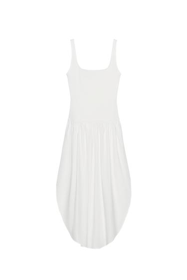 Front view of a sleeveless white dress with a square neckline and a flared skirt.