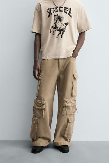 PANTALÓN DENIM CARGO BOLSILLOS - Tostado de Zara