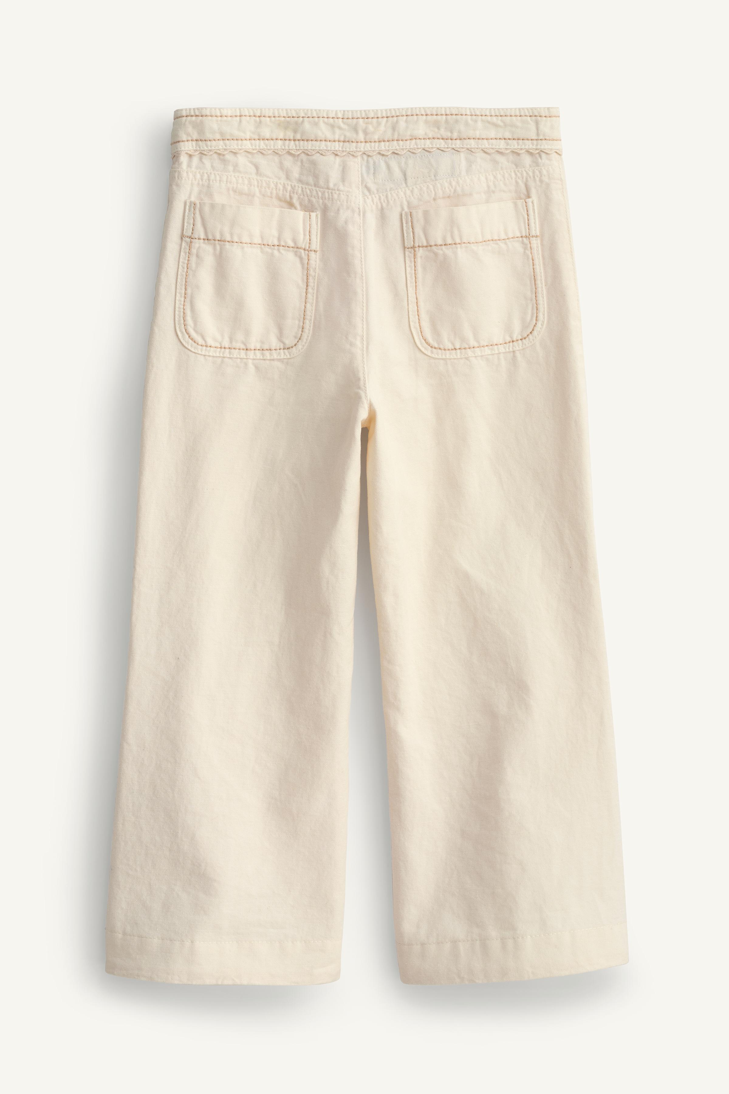 PANTALON FLARE SURPIQÛRES LIMITED EDITION
