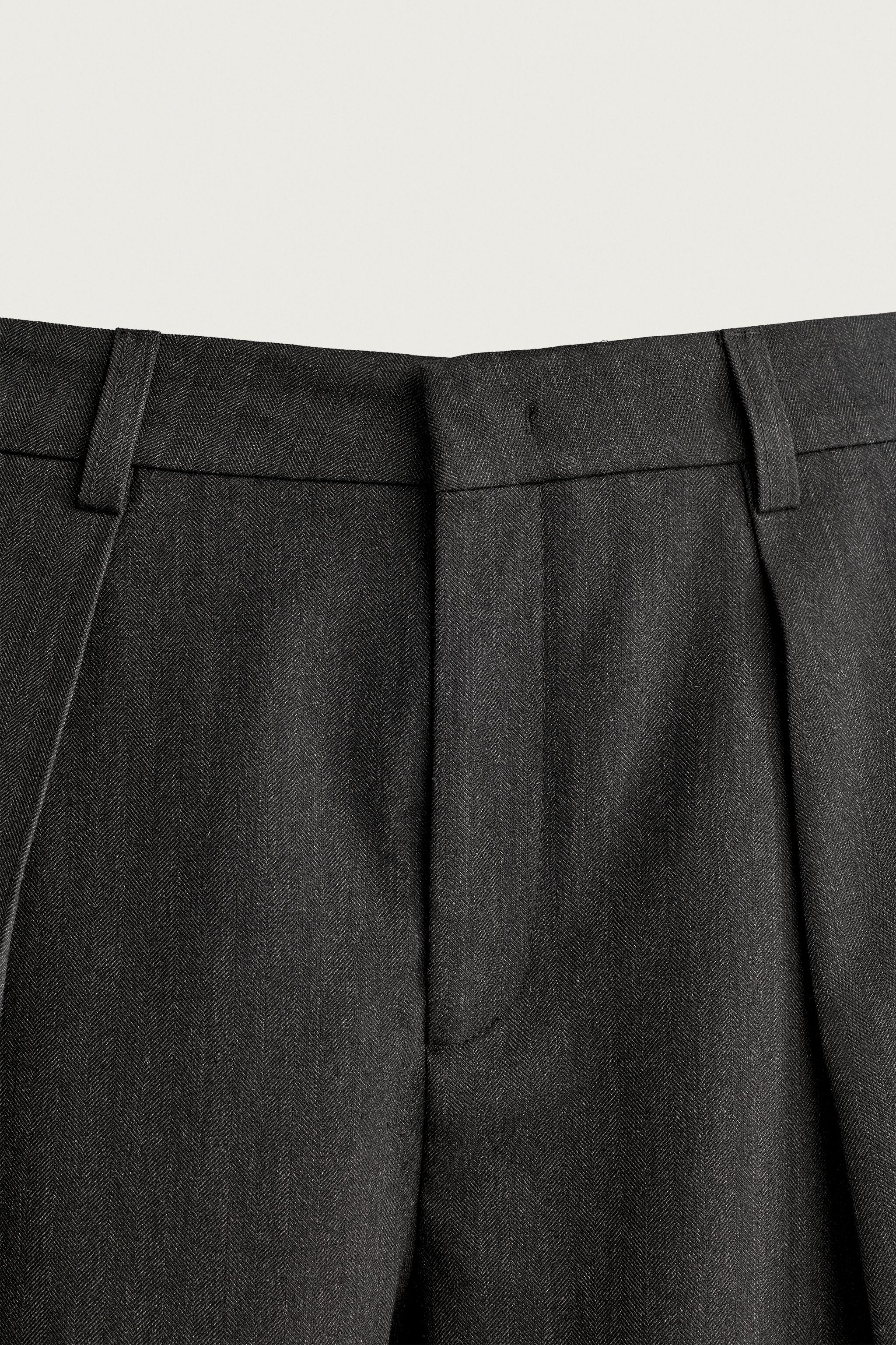 PLEATED RELAXED-FIT PANTS