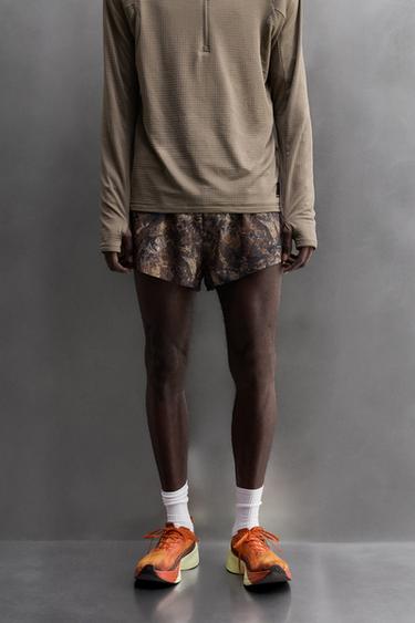 Zara TREE PRINT RUNNING SHORTS - Oranges