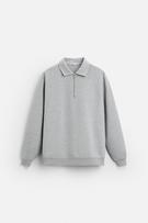 ZIPPERED INTERLOCK POLO SHIRT