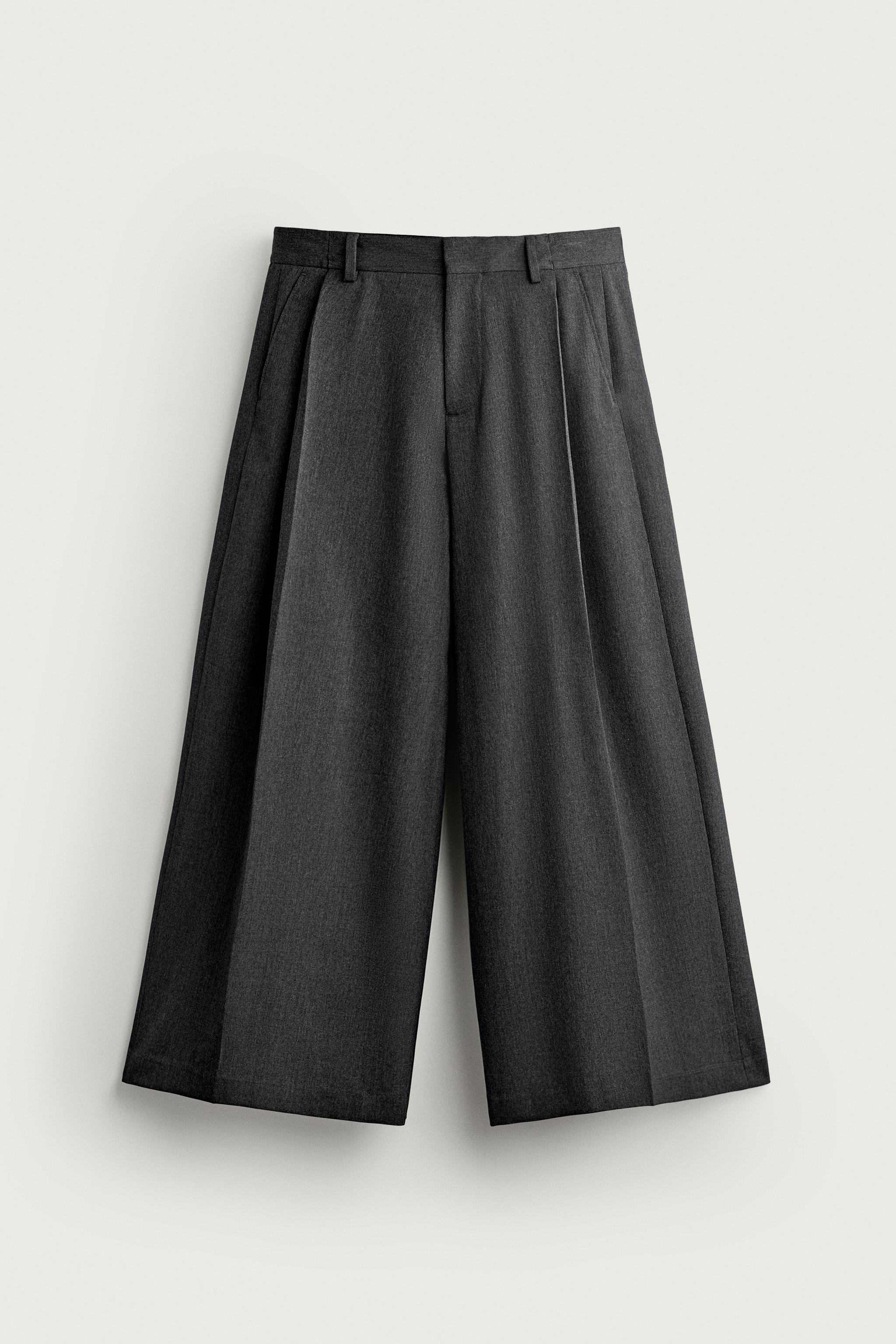 WIDE-FIT PLEATED PANTS