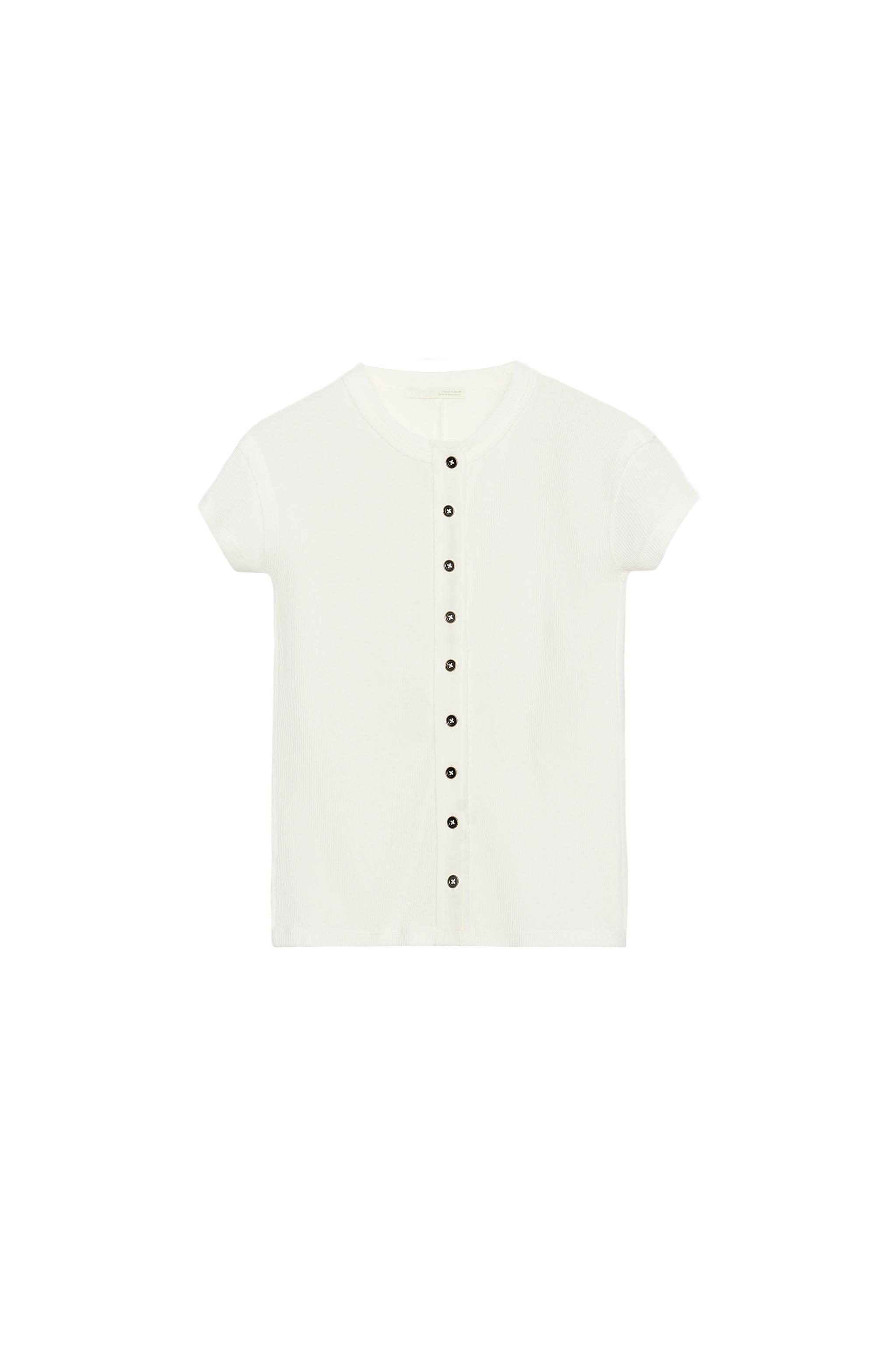 CAMISETA TAPETA BOTONES